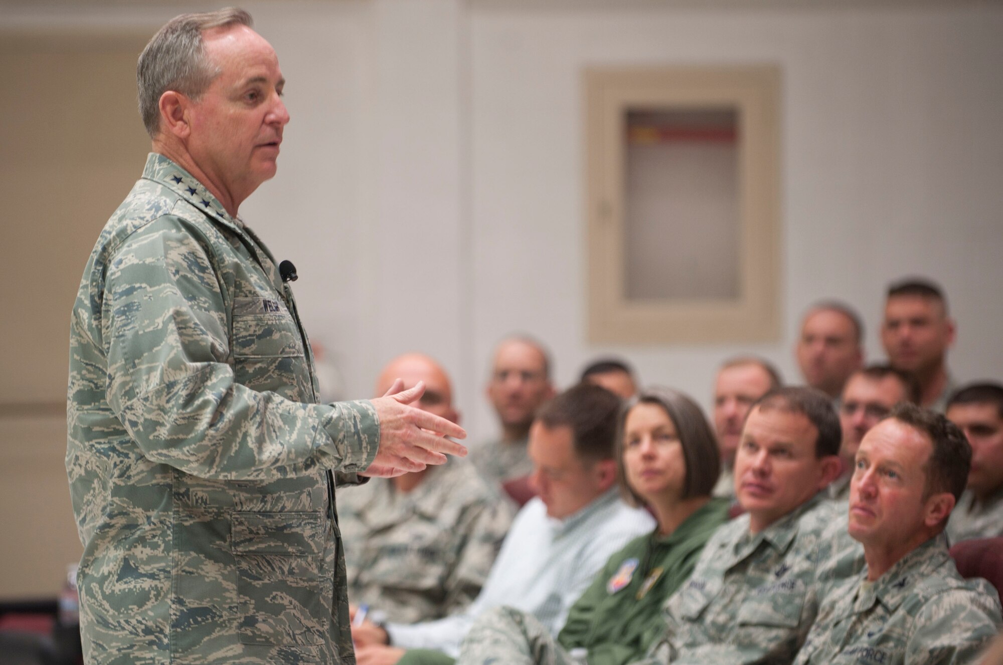 Air Force Chief of Staff Gen. Mark A. Welsh III briefs Airmen about force reduction and various topics at Mountain Home Air Force Base, Idaho, May 1, 2014. Airmen had the opportunity to speak to Welsh and ask questions about ongoing force reduction issues. The Air Force is currently experiencing the fifth highest force reduction initiative since the force’s inception, Sept. 18, 1947. (U.S. Air Force photo by Airman 1st Class Malissa Lott/RELEASED)