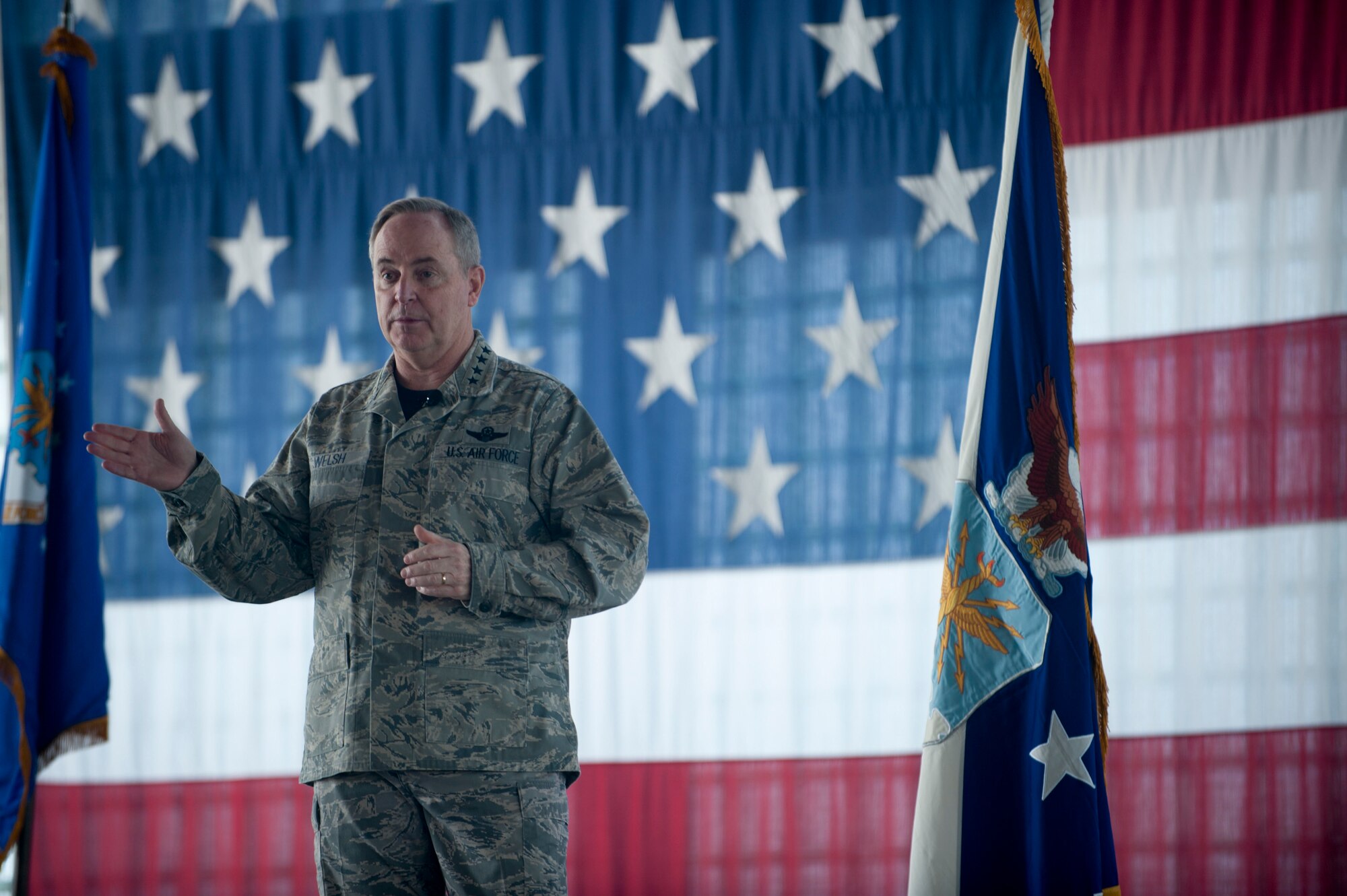 Air Force Chief of Staff Mark A. Welsh III speaks to an audience of military and civilians during an all call at Mountain Home Air Force Base, Idaho, May 2, 2014. Welsh and his wife, Betty, visited the base and discussed current Air Force issues like force reductions. (U.S. Air Force photo by Airman 1st Class Malissa Lott/RELEASED)