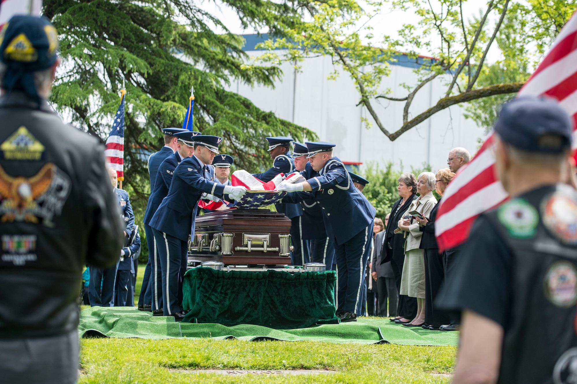 McChord Field Honor Guard members fold the flag that was draped over the casket of Air Force Capt. Douglas D. Ferguson, May 2, 2014, at Mountain View Funeral Home in Lakewood, Wash. A Tacoma native and class of 1963 graduate of Wilson High School, Ferguson was killed in the Vietnam War and was finally laid to rest back home after being missing for more than 44 years. (U.S. Air Force photo/Tech. Sgt. Sean Tobin)