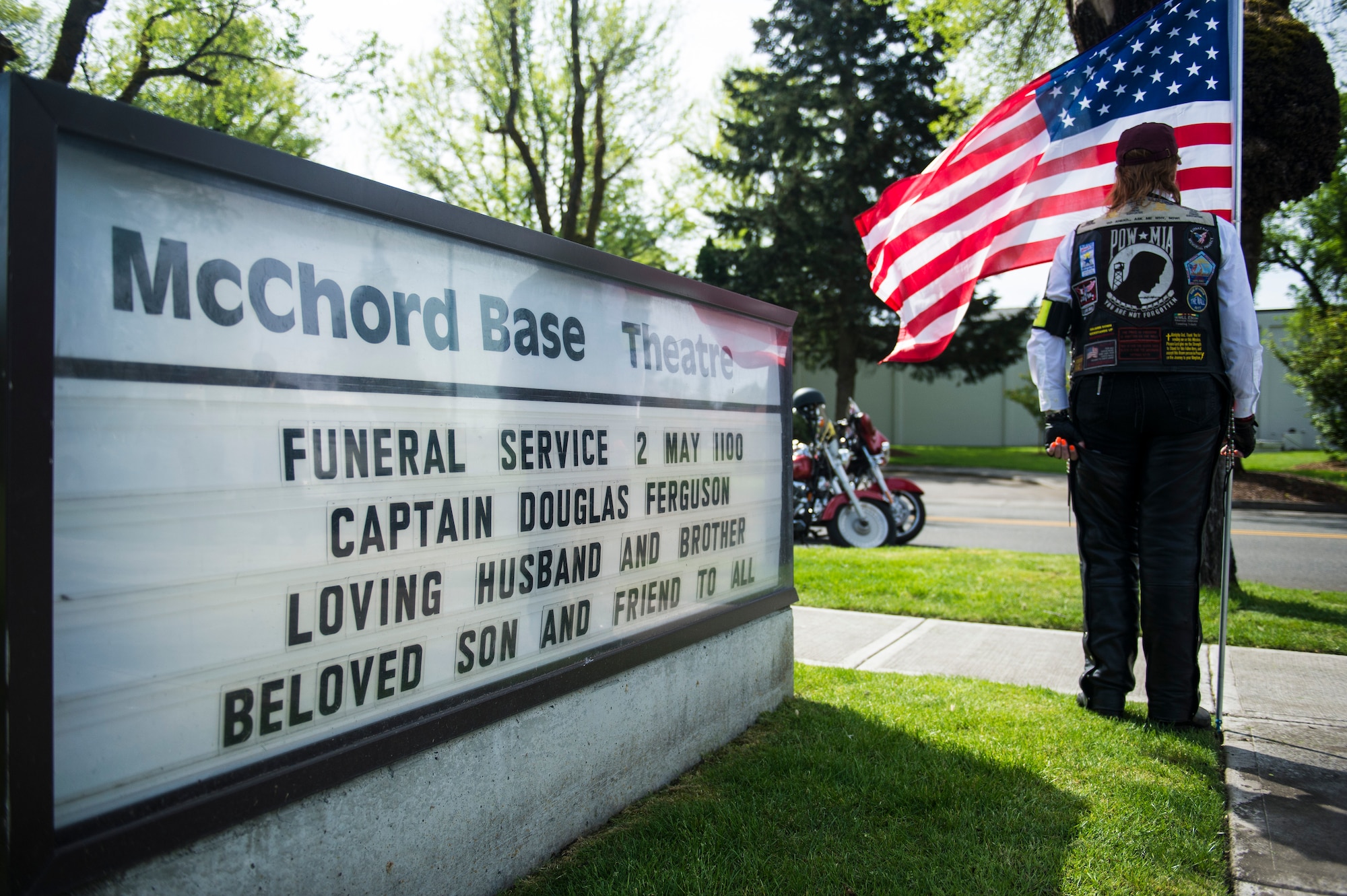 A member of the Patriot Guard Riders stands guard outside the McChord Theater April 2, 2014, at Joint Base Lewis-McChord. Dozens of Patriot Guard Riders stood guard during the funeral service of Capt. Douglas D. Ferguson whose airplane was shot down during the Vietnam War in 1969. (U.S. Air Force photo/Tech. Sgt. Sean Tobin)