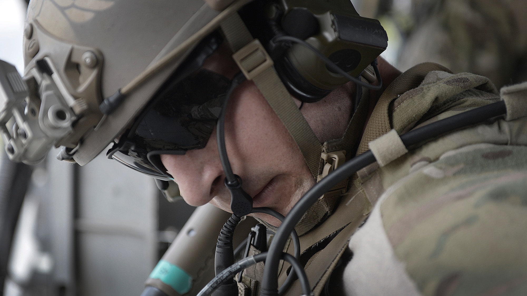 U.S. Air Force Senior Airman Derek Hemerick, 83rd Expeditionary Rescue Squadron, 455 Air Expeditionary Wing pararescueman, prepares his gear for a training mission at Bagram Airfield, Afghanistan May 5, 2014.  The squadron participated in a training scenario where a vehicle simulated striking an Improvised Explosive Device.  During the training, rescue crews flew on HH-60G Pave Hawk helicopters to the simulated point of injury, provided security, treated patients, prepared them for travel, and safely departed the area.  Hemerick is a native of San Clemente, Calif. and is deployed from Moody Air Force Base, Ga. (U.S. Air Force photo by Staff Sgt. Evelyn Chavez/Released)