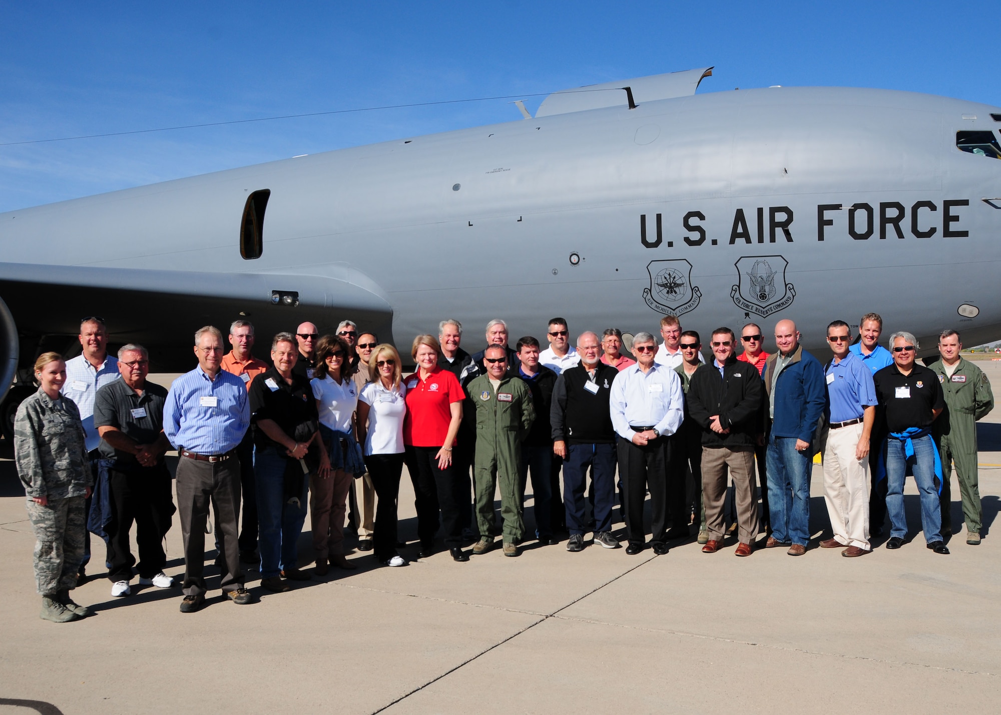 A group of Arizona civic leaders pose for a photo in front of a KC-135 before departing for Naval Air Station Joint Reserve Base, Fort Worth, Texas on a two day civic leader tour. (U.S. Air Force photo taken by Tech. Sgt. Louis Vega Jr.)