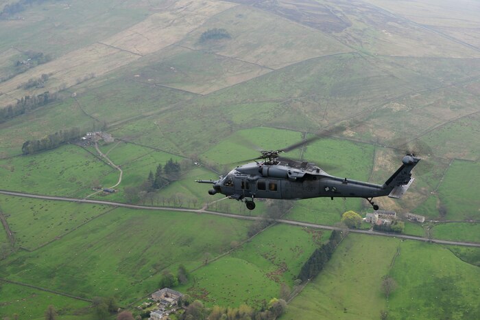 An HH-60G Pave Hawk assigned to the 56th Rescue Squadron returns to Royal Air Force Leeming after electronic warfare training at RAF Spadeadam, England, April 29, 2014. The 56th RQS spent a week at RAFs Leeming and Spadeadam training to survive, deny and defeat radar threats. (U.S. Air Force photo by Staff Sgt. Emerson Nuñez/Released)