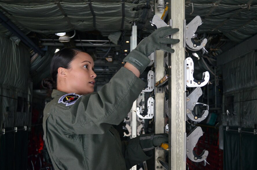 Air Force Staff Sgt. Baily Zimmerman, an aircrew aerospace medical craftsman assigned to the 43rd Aeromedical Evacuation Squadron, configures a C-130 Hercules to accommodate in-flight patient care prior to a local aeromedical readiness training mission on March 19, 2014 at Pope Army Airfield, Fort Bragg, N.C. (U.S. Air Force photo/Marvin Krause)
