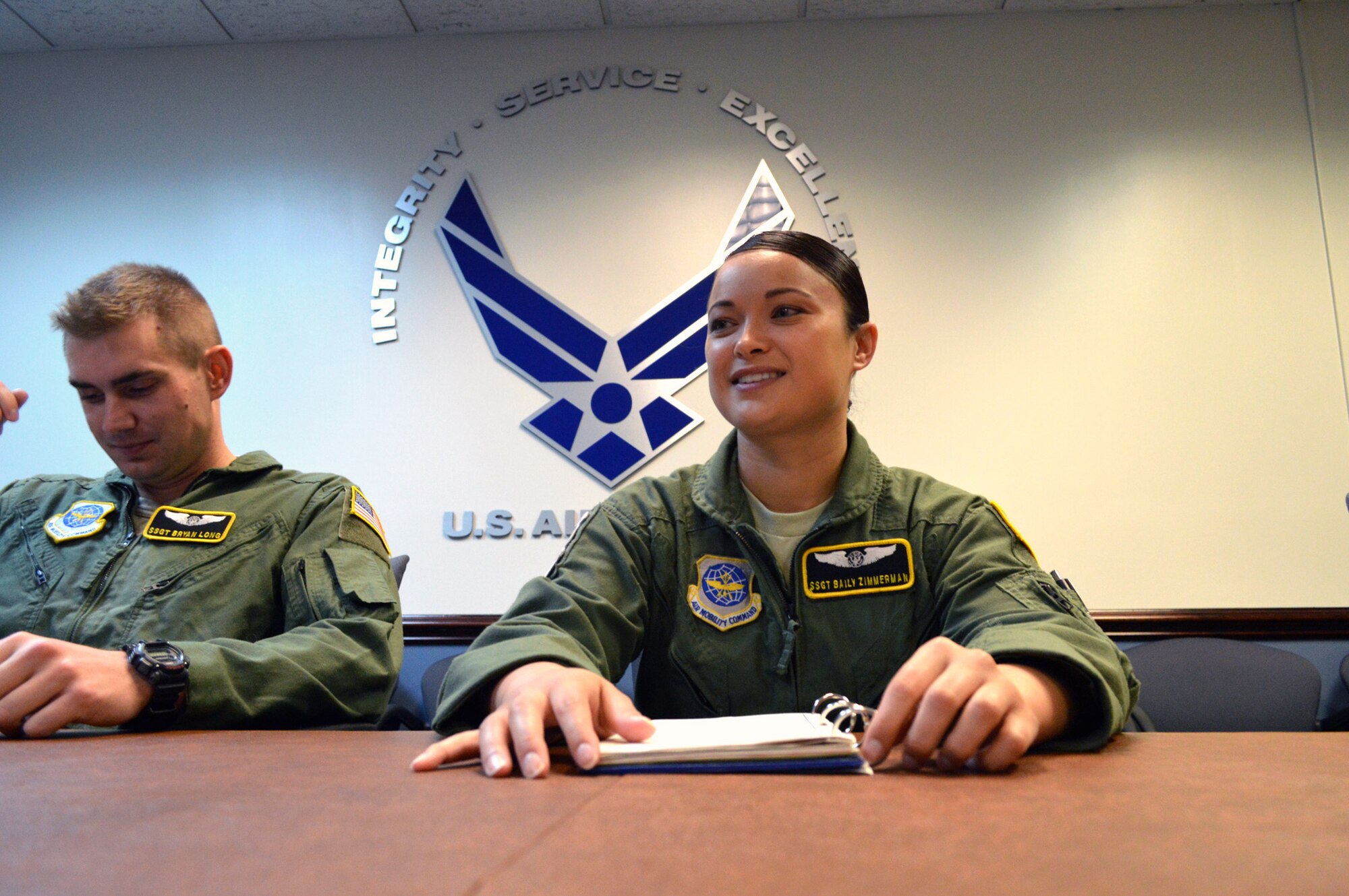 Air Force Staff Sgt. Baily Zimmerman, an aircrew aerospace medical craftsman assigned to the 43rd Aeromedical Evacuation Squadron, attends an aeromedical evacuation flight briefing prior to a local C-130 Hercules aeromedical readiness training mission on March 19, 2014 at Pope Army Airfield, Fort Bragg, N.C. (U.S. Air Force photo/Marvin Krause)