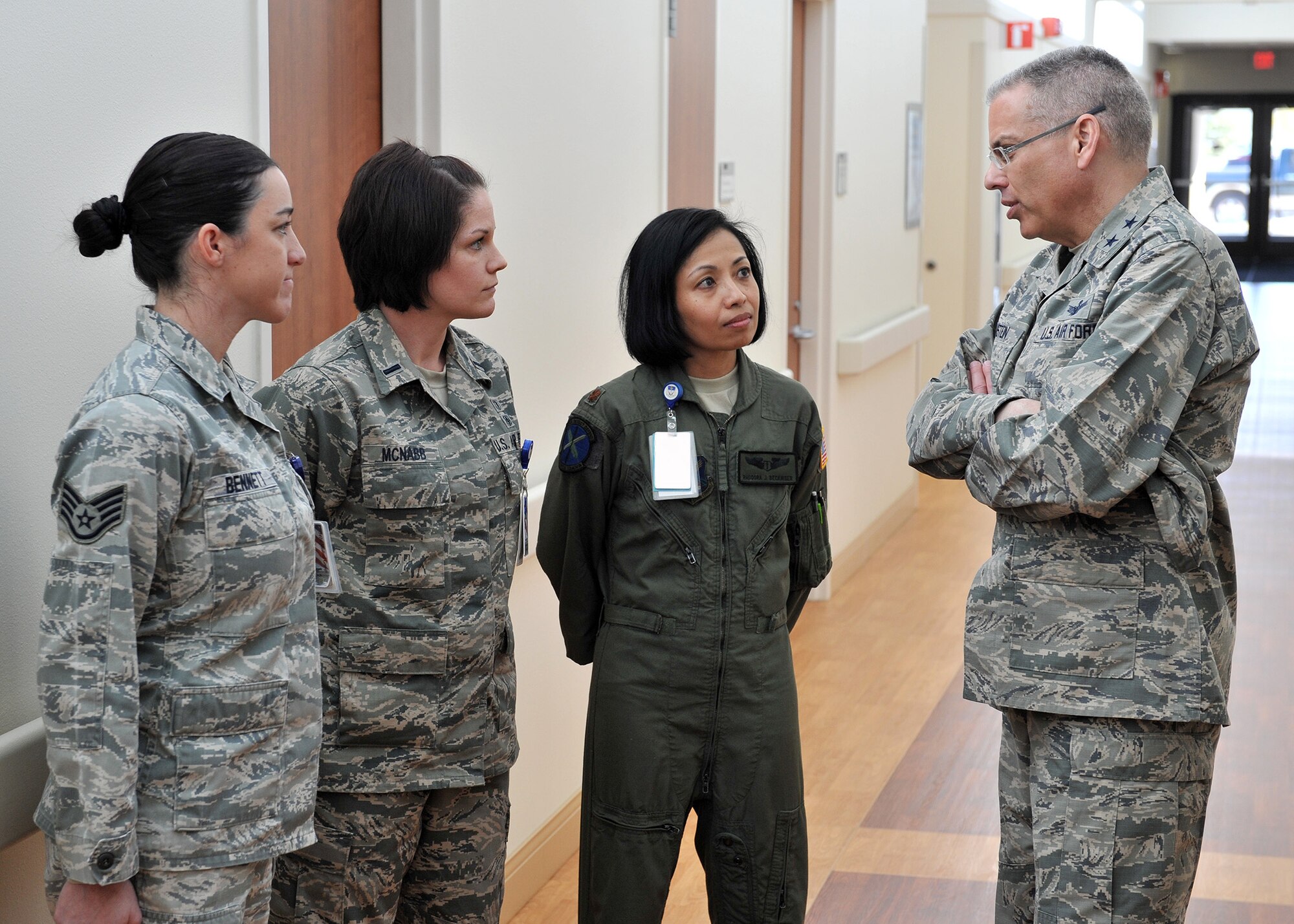 Maj. Gen. Jack Weinstein, 20th Air Force commander (right), recognizes members of the 341st Medical Group’s mental health staff for superior performance during his tour of the Malmstrom Air Force Base clinic April 1. Pictured (from right to left) are Maj. Rhodora Beckinger, 341st Medical Operations Squadron flight surgeon; 1st Lt. Morgan McNabb, 341st MDOS staff social worker; and Staff Sgt. Brooke Bennett, 341st MDOS NCO in charge of the mental health clinic. (U.S. Air Force photo / John Turner)