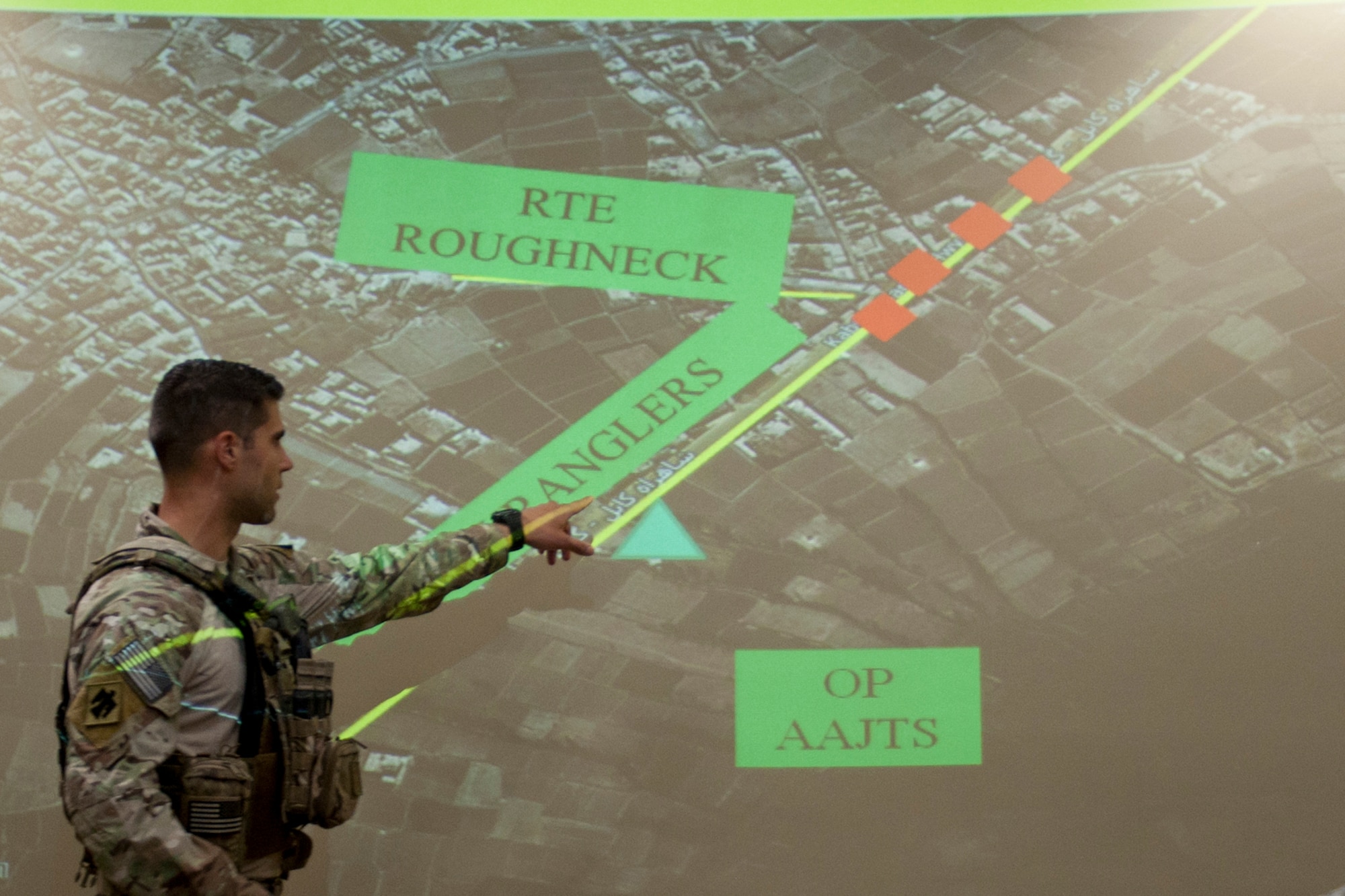 A member of the 146th Air Support Operations Squadron (ASOS), participates in training utilizing the Air National Guard Advanced Joint Terminal Attack Controller Training System (AAJTS) to Brig. Gen. Hopper Smith, assistant adjutant general-Army for the Oklahoma National Guard, during an unveiling of the first operational AAJTS in the nation at Will Rogers Air National Guard Base in Oklahoma City. The AAJTS is a high-fidelity, fully immersive, simulator designed to support Air National Guard (ANG) Joint Terminal Attack Controller (JTAC) and Combat Controller squadron level continuation, qualification and mission rehearsal training. The AAJTS system encompasses high fidelity visual displays, geo-specific visual data bases, equipment emulators, and associated hardware and software. The AAJTS is designed to meet the requirements for unit training at Air Support Operations Squadrons (ASOS) and Special Tactics Squadrons (STS).
PHOTO: Maj. Geoff Legler, Oklahoma National Guard Public 