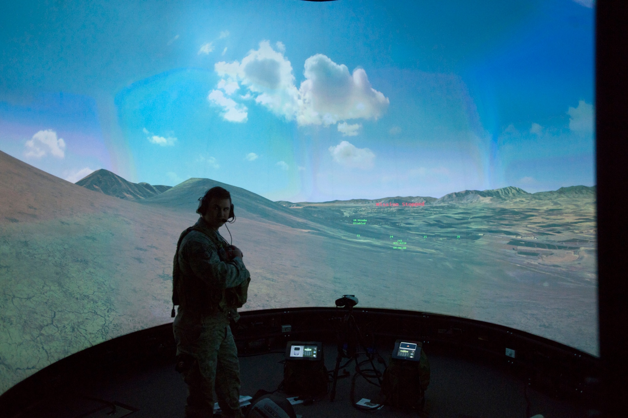 A member of the 146th Air Support Operations Squadron (ASOS), participates in training utilizing the Air National Guard Advanced Joint Terminal Attack Controller Training System (AAJTS) to Brig. Gen. Hopper Smith, assistant adjutant general-Army for the Oklahoma National Guard, during an unveiling of the first operational AAJTS in the nation at Will Rogers Air National Guard Base in Oklahoma City. The AAJTS is a high-fidelity, fully immersive, simulator designed to support Air National Guard (ANG) Joint Terminal Attack Controller (JTAC) and Combat Controller squadron level continuation, qualification and mission rehearsal training. The AAJTS system encompasses high fidelity visual displays, geo-specific visual data bases, equipment emulators, and associated hardware and software. The AAJTS is designed to meet the requirements for unit training at Air Support Operations Squadrons (ASOS) and Special Tactics Squadrons (STS).
PHOTO: Maj. Geoff Legler, Oklahoma National Guard Public Affairs