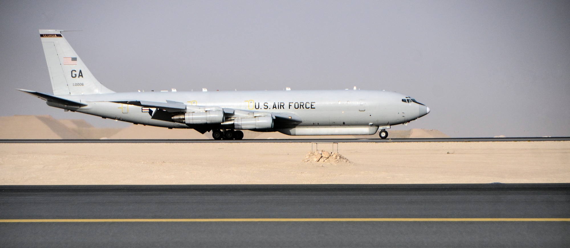An E-8C Joint Surveillance Target Attack Radar System lands at Al Udeid Air Base, Qatar, May 1, 2014, after reaching a milestone of 100,000 flying hours to include more than 88,000 hours in the U.S. Central Command area of responsibility since 2001. The JSTARS mission is to provide ground commanders with intelligence, surveillance and reconnaissance air power to boost force protection, defensive operations, over-watch and combat search and rescue missions throughout the AOR.  (U.S. Air Force photo/Senior Airman Jared Trimarchi)