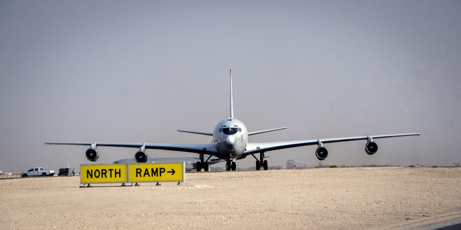 An E-8C Joint Surveillance Target Attack Radar System approaches the runway at an air base in Southwest Asia, May 1, 2014, after reaching a milestone of 100,000 flying hours to include more than 88,000 hours in the U.S. Central Command area of responsibility since 2001. The JSTARS mission is to provide ground commanders with intelligence, surveillance and reconnaissance air power to boost force protection, defensive operations, over-watch and combat search and rescue missions throughout the AOR. (U.S. Air Force photo/Senior Airman Jared Trimarchi) 