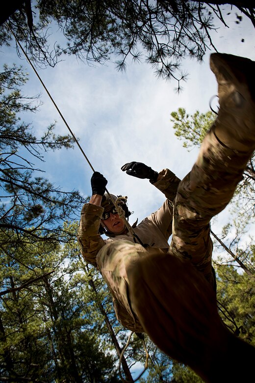 A U.S. Air Force pararescueman from the 58th Rescue Squadron out of Nellis Air Force Base, Nev., performs tree let-down procedures May 5, 2014, at Camp Navajo, Ariz., in part of Angel Thunder. Davis-Monthan Air Force Base, Ariz., conducted the first Angel Thunder in 2006 as a base-specific exercise. It has since grown to be the largest and most realistic joint service, multinational, interagency combat search and rescue exercise in the world. (U.S. Air Force photo by Staff. Sgt. Jamal D. Sutter/Released)  