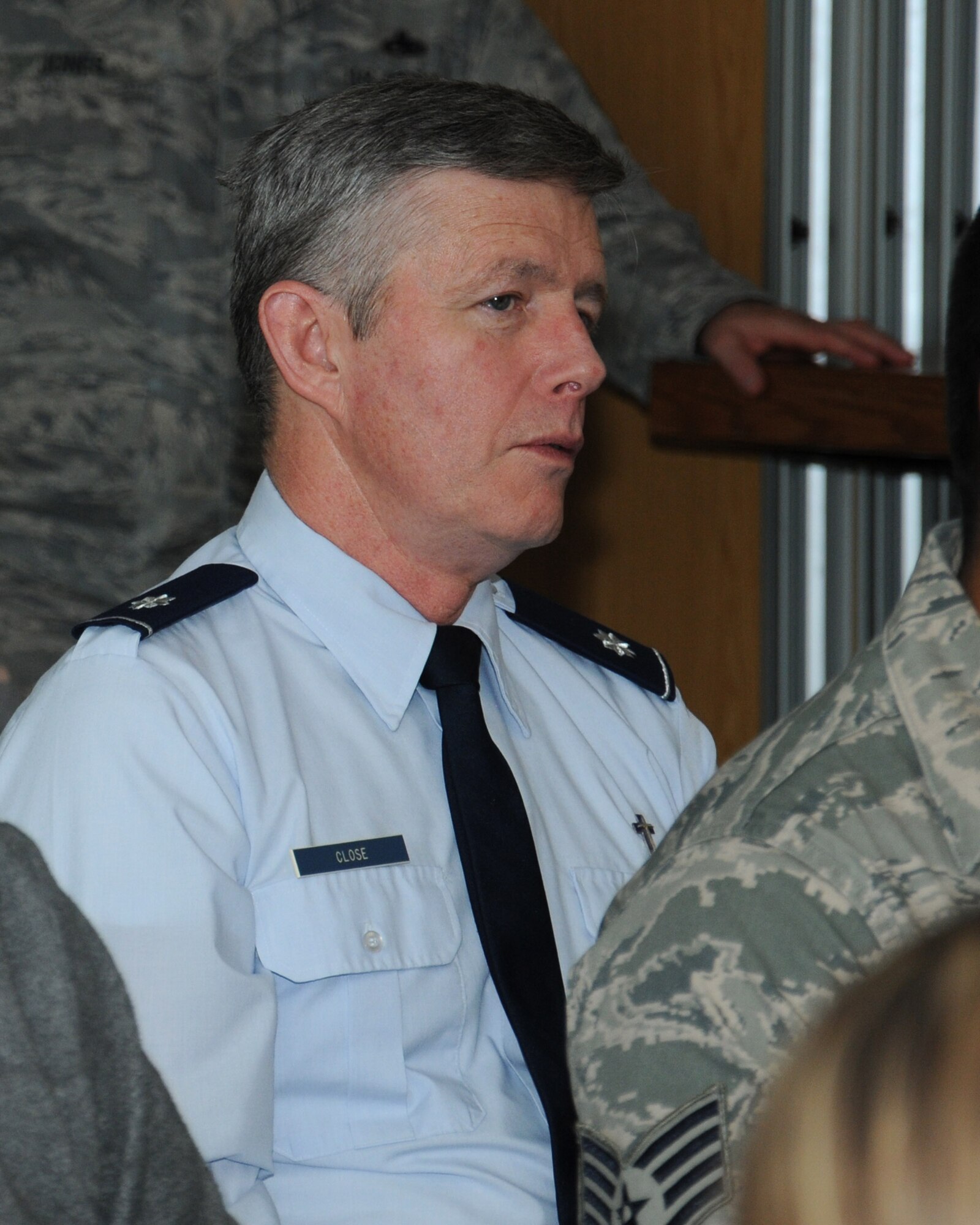 U.S. Air Force Lt. Col. Henry Close, 100th Air Refueling Wing Chaplain, talks to Zigi Shipper, a holocaust survivor, during a question and answer session April 30, 2014, in the base chapel on RAF Mildenhall, England. Shipper was born to Orthodox Jewish parents in Poland in 1930 and spent many years in ghettos and concentration camps during World War II. When he was five years old his parents divorced but because they were Orthodox Jews and divorce was frowned upon, he was told that his mother had died. Following the liberation of the concentration camp in May 1945, Shipper was saved by British soldiers. After surviving a near-death illness, Shipper was reunited with his mother, who was living in England. Shipper now lives in Hertfordshire and regularly shares his testimony in schools across the country. (U.S. Air Force photo by Gina Randall/Released)