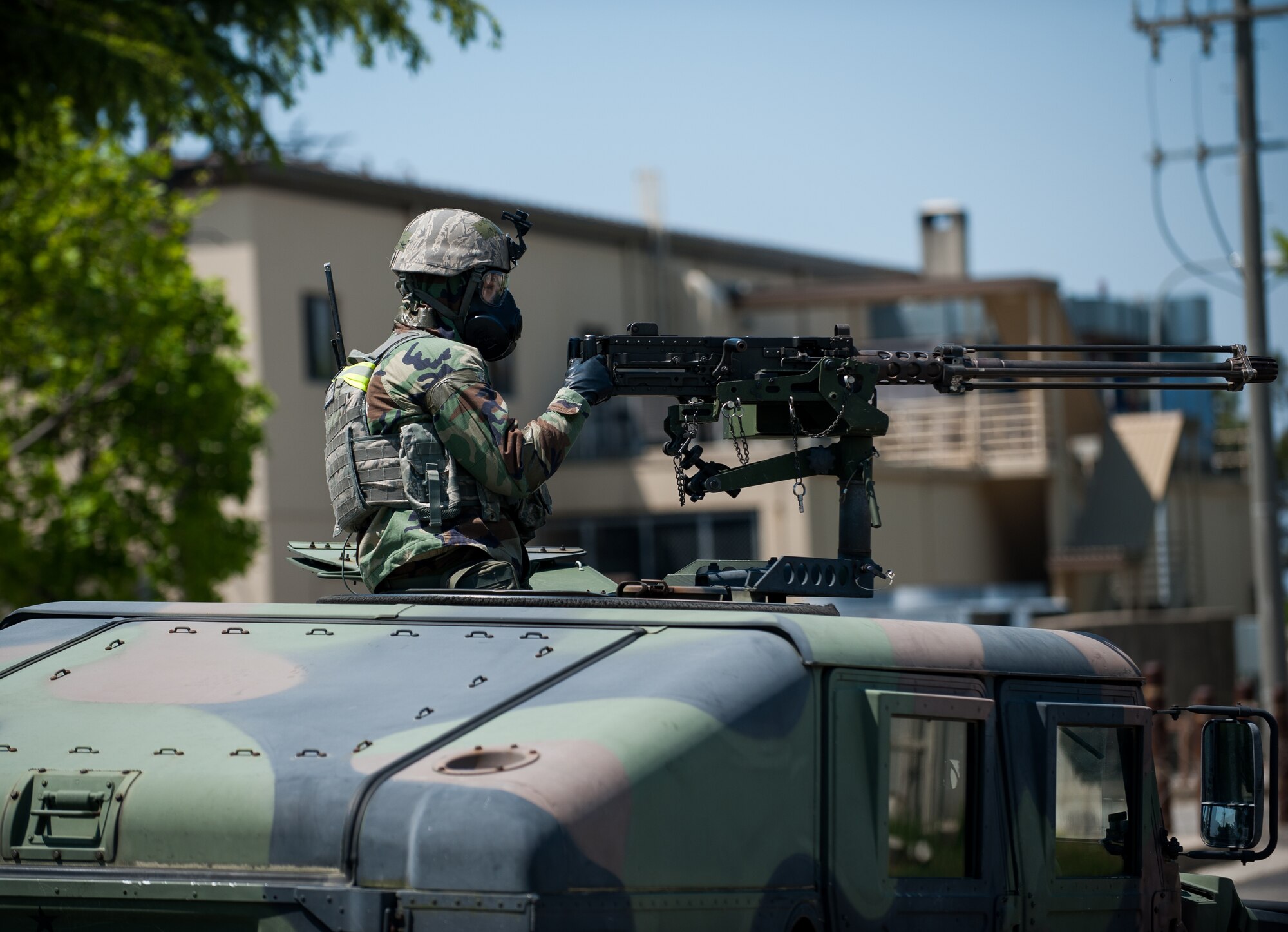 Airman 1st Class Matthew Snipes, 8th Security Forces Squadron team member, patrols under alarm black during exercise Beverly Bulldog 14-2 at Kunsan Air Base, Republic of Korea, May 7, 2014. The Wolf Pack continued to prove its combat readiness as they entered the third day of the peninsula-wide operational readiness exercise. (U.S. Air Force photo by Staff Sgt. Clayton Lenhardt/Released)