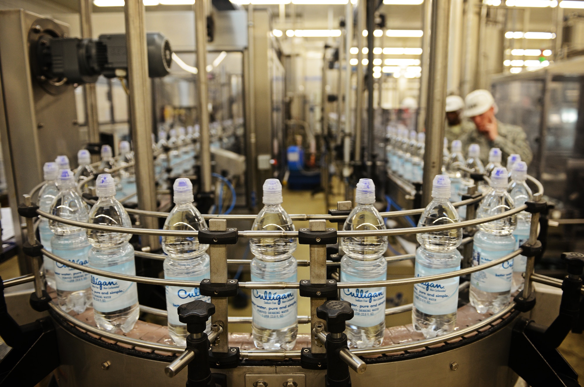 Chiefs from Ramstein Air Base Germany tour the Army and Air Forces Exchange Service Culligan water plant in Gruenstadt, Germany during a familiarization tour April 30, 2014. The Gruenstadt facility is the central production location for more than 250 line items, as well as cold storage for 200 line items and even produces five million gallons of Culligan bottled water each year. The plant distributes to more than 100 locations in 25 countries and has been in business since 1953. (U.S. Air Force photo/ Staff Sgt. Ryan Crane)