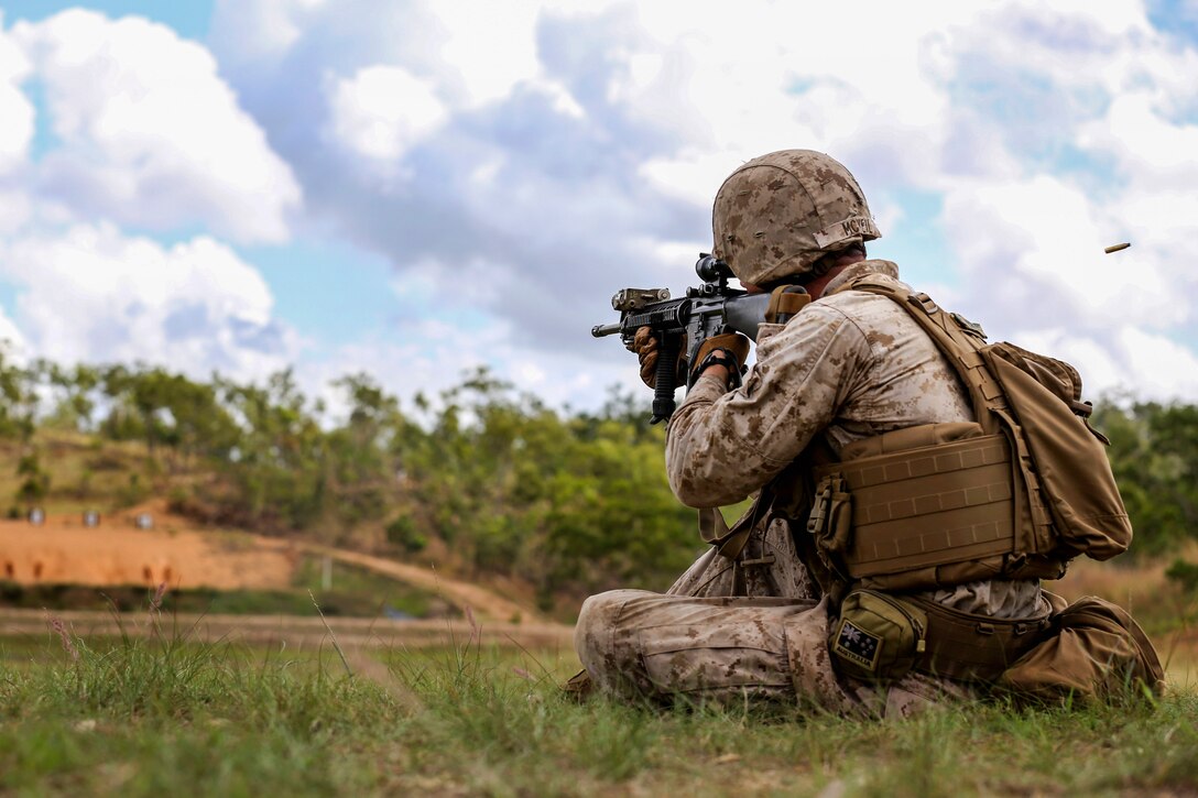 U.S. Marine Corps Lance Cpl. Mitchell McNeil fires his weapon at targets during a live-fire exercise on Kangaroo Flats Training Area in Darwin, Australia, May 1, 2014. McNeil, an infantryman, is assigned to Bravo Company, 1st Battalion, 5th Marine Regiment, Marine Rotational Force Darwin.