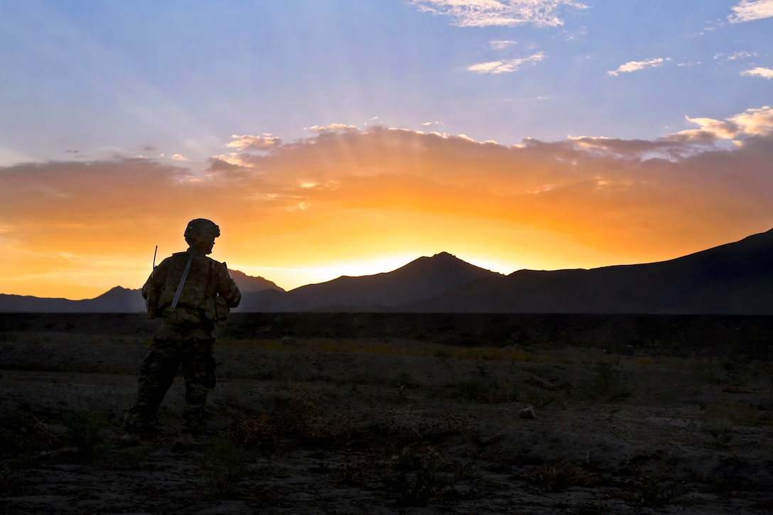 A U.S. soldier takes a break during a mission to clear Route 1 of improvised explosives in Wardak province, Afghanistan, Aug. 13, 2013. The soldier, assigned to the 87th Sapper Company, conducted the clearing mission to maintain freedom of movement for military and commercial traffic.  
