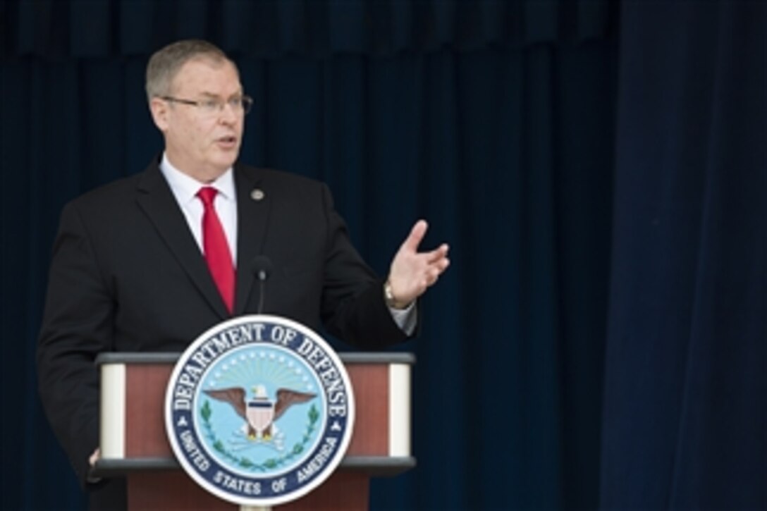 Deputy Defense Secretary Bob Work presides over the Public Service Recognition Week's ceremony to honor 34 civilians for their contributions to the Defense Department at the Pentagon, May 7, 2014.