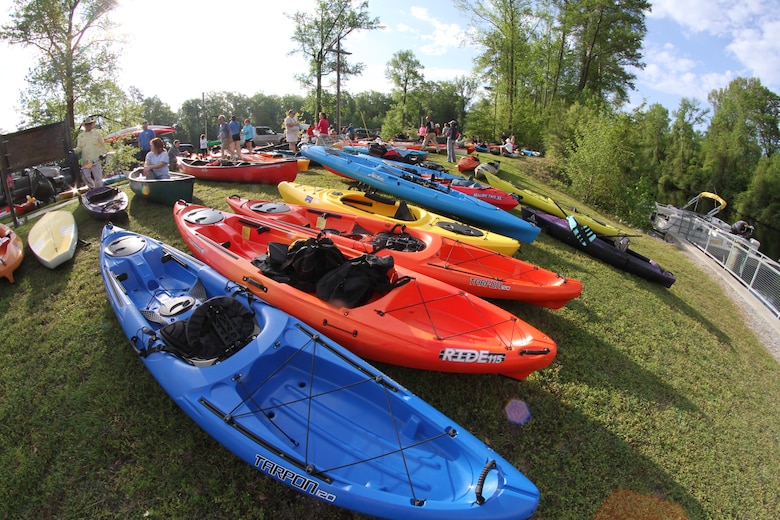 As the first light of day tried to peek through gray clouds, hundreds of cars and trucks arrived and began to unload kayaks and canoes onto the banks of the historical Dismal Swamp Canal for the 11th Annual Paddle for the Border May 3. 