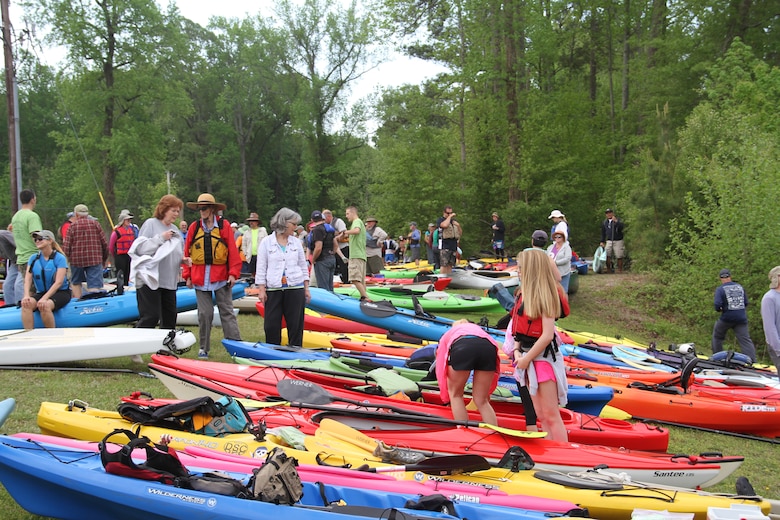 As the first light of day tried to peek through gray clouds, hundreds of cars and trucks arrived and began to unload kayaks and canoes onto the banks of the historical Dismal Swamp Canal for the 11th Annual Paddle for the Border May 3. Paddlers traveled from several states, as well as localities throughout North Carolina and Virginia, to participate this year. 
