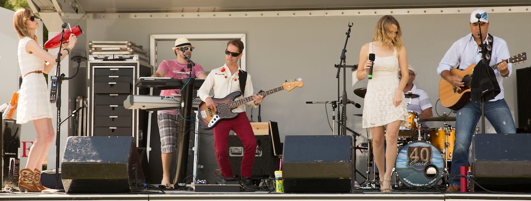 The “40 East Band,” a musical act based in Wilmington, N.C., performs during Jacksonville’s Jamboree, May 3, at the Jacksonville Commons Complex. The annual event is hosted by Jacksonville’s Recreation and Parks department and features family-friendly entertainment including musical acts, a car display, a petting zoo and statewide sports competitions for softball, basketball, baseball, tennis and other sports.