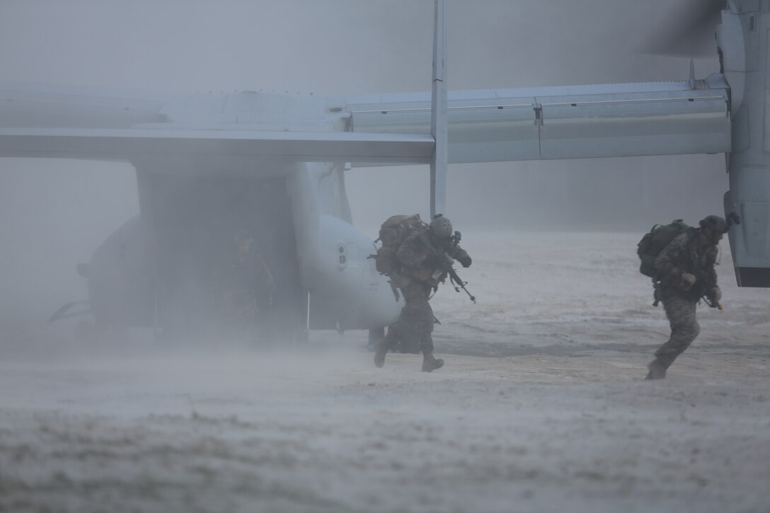 Individual Training Course students with Marine Special Operations School at Stone Bay, here, participate in the field training exercise Raider Spirit.  Raider Spirit is an eight-day culminating event for the first phase of ITC training, where students run light infantry scenarios as a field team. Throughout the exercise, student teams face many challenges as a result of an operationally restrictive scenario and numerous long distance foot movements with little sleep.