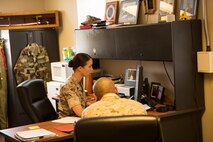 Sgt. Samantha Swords, a Queens, N.Y., native and acting battalion sergeant major for Combat Logistics Battalion 2, Combat Logistics Regiment 2, 2nd Marine Logistics Group, works at the sergeant major’s desk during the battalion’s NCO day aboard Camp Lejeune, N.C., May 6, 2014. The battalion assigned various enlisted Marines to fill command positions where they attended staff briefings, maintained accountability for all the Marines within the battalion, and handled all the daily tasks normally assigned to senior leadership. (U.S. Marine Corps photo by Cpl. Shawn Valosin)