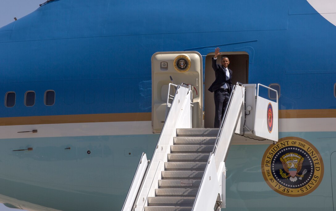 MARINE CORPS AIR STATION MIRAMAR, Calif. –President Barack Obama, president of the United States of America, waves to media as he prepares to leave Marine Corps Air Station Miramar, Calif., after a fundraising event in La Jolla, Calif., May 8. President Obama visited California as part of a three-day Democratic fundraising event.