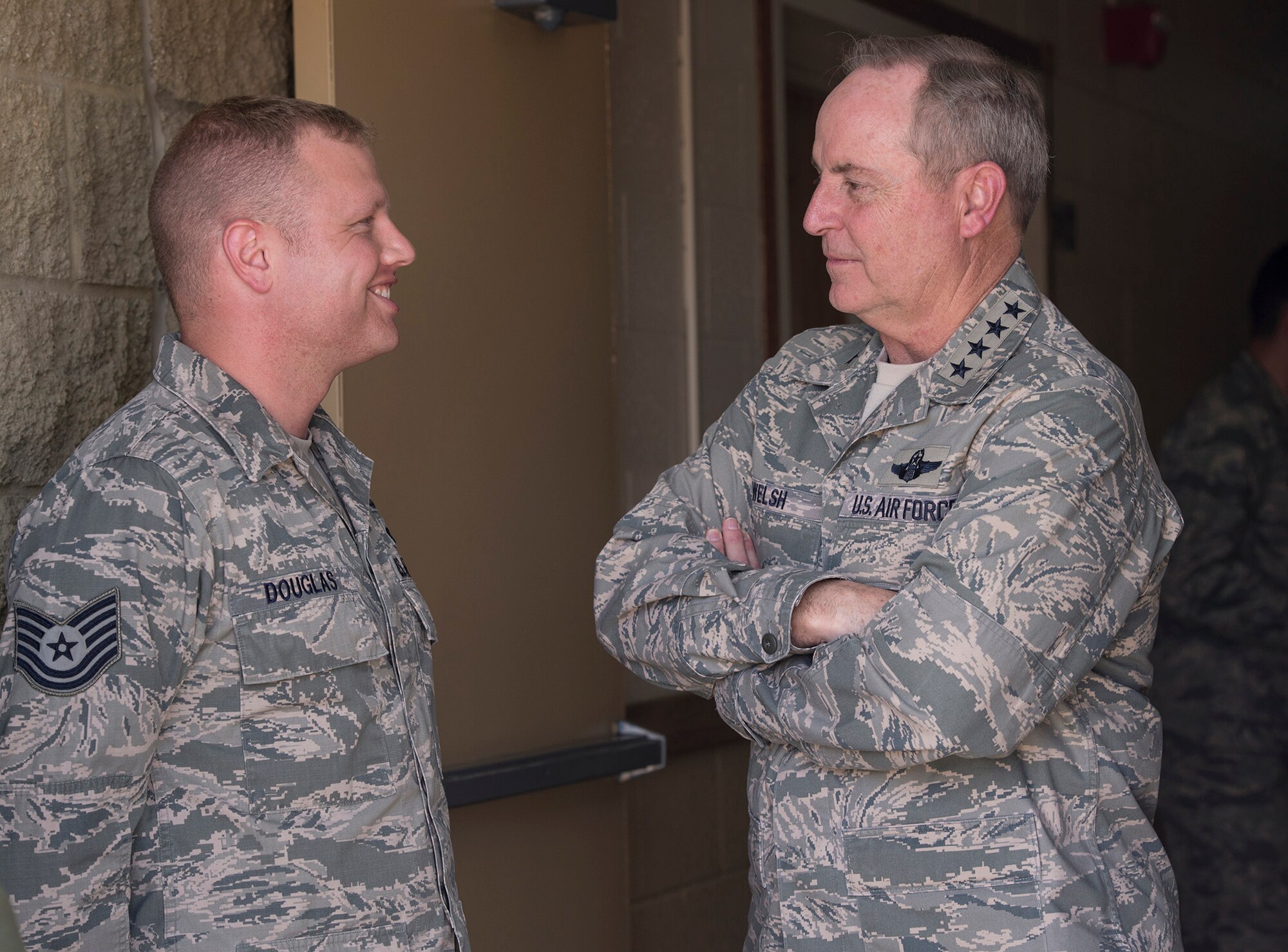 Air Force Chief of Staff Gen. Mark A. Welsh III mentors Tech. Sgt. Ryan Douglas, 366th Operations Support Squadron, during the general’s visit to Mountain Home Air Force Base, Idaho, May 1, 2014. Welsh and his wife, Betty, spent two days at the base meeting with Airmen and units, and discussing ongoing Air Force issues. (U.S. Air Force photo by Master Sgt. Kevin Wallace/RELEASED)