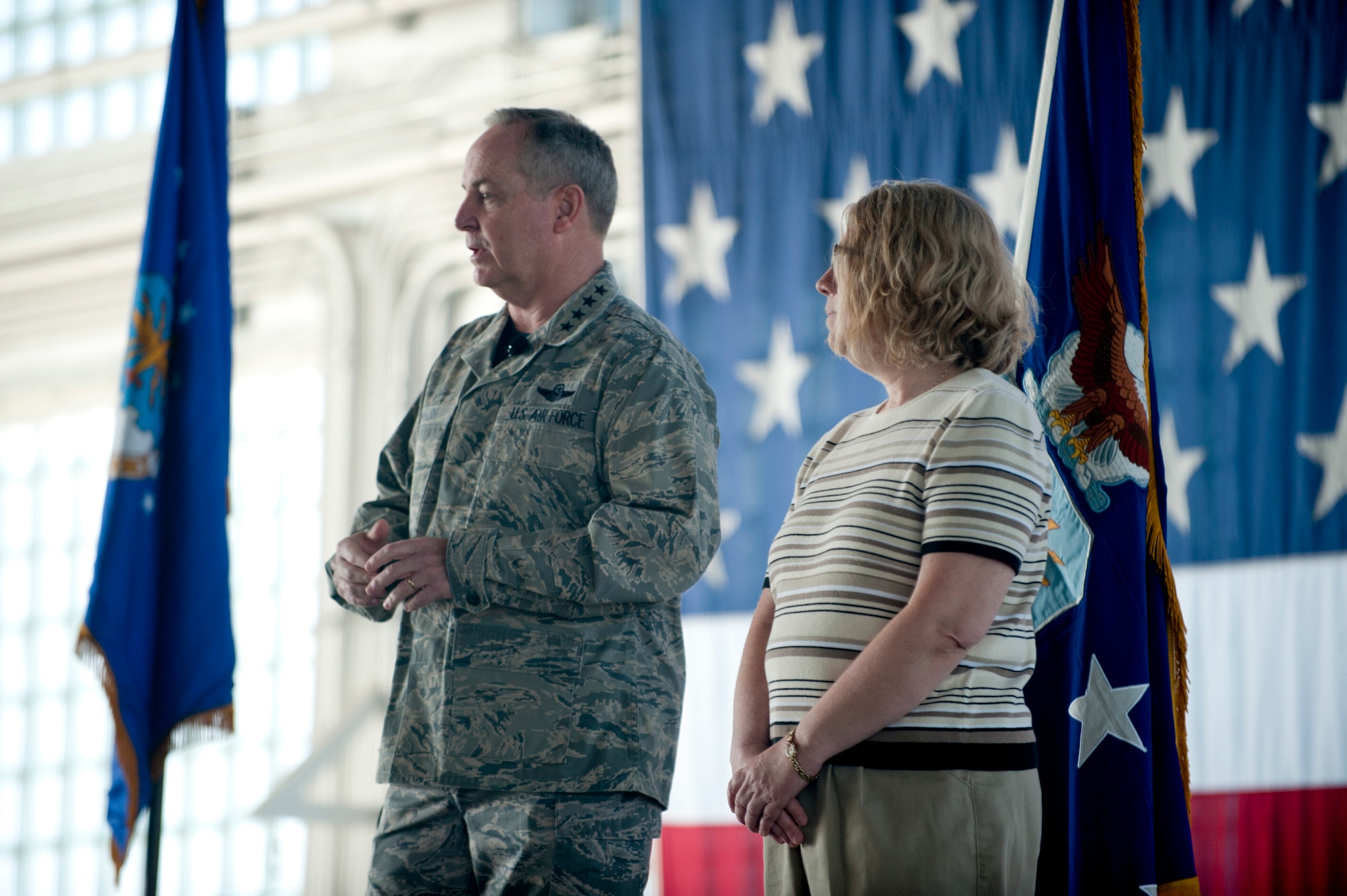 Air Force Chief of Staff Mark A. Welsh III recognizes Cynthia Tortolano, 366th Contracting Squadron, during an all call at Mountain Home Air Force Base, Idaho, May 2, 2014. Welsh and his wife, Betty, visited the base and discussed current Air Force issues like force reductions. (U.S. Air Force photo by Airman 1st Class Malissa Lott/RELEASED)