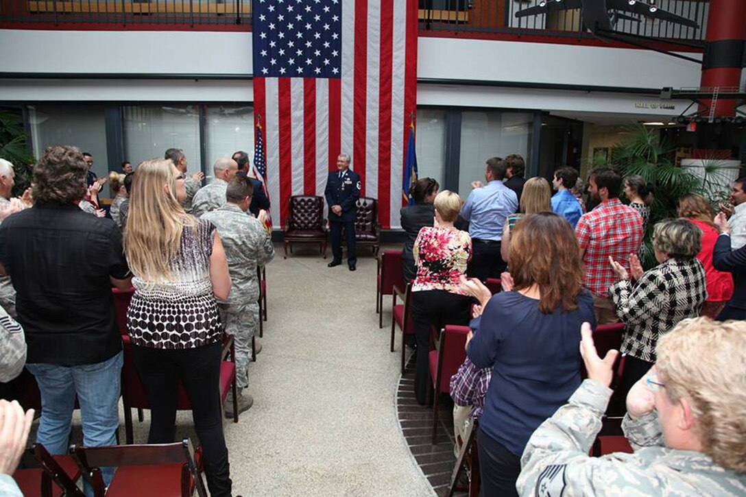 TRAVIS AIR FORCE BASE, Calif. -- Friends and family celebrated the career of Master Sgt. Richard Ziesche, supervisor of safety, 349th Maintenance Group, during a retirement ceremony April 27, 2014 at Travis Air Force Base, Calif. Col. M. J. (Sonny) Giddings, Jr., 349th Air Mobility Wing, was the officiating officer and presented Ziesche with the Meritorious Service Medal. (U.S. Air Force photo/Lt. Col. Robert Couse-Baker)