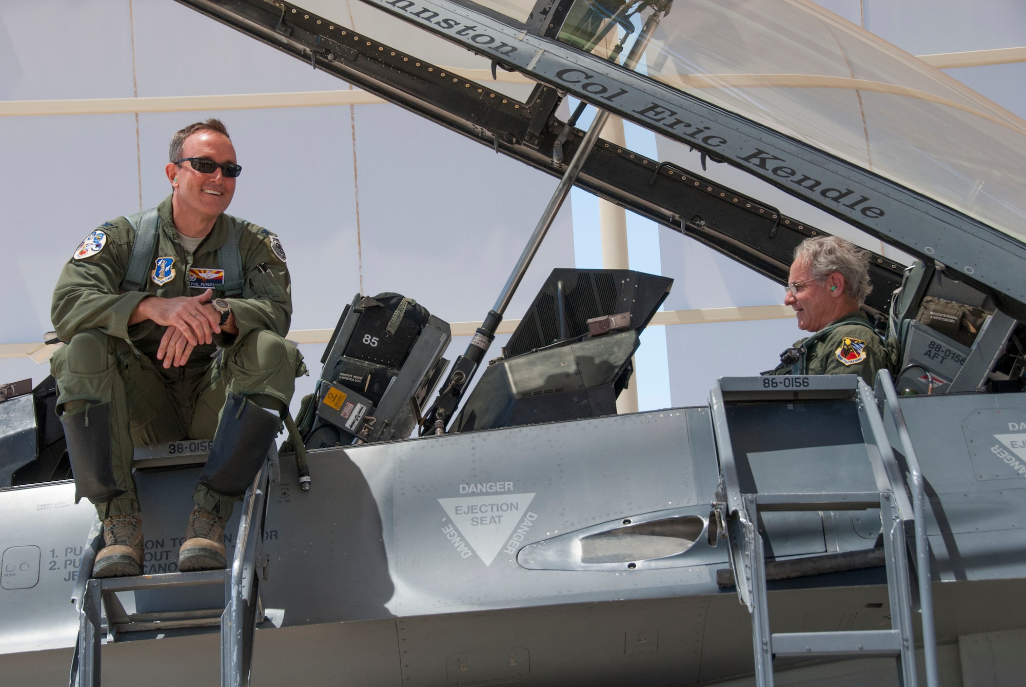 Jonathan Rothschild, Mayor of Tucson, gets settled into the F-16 Fighting Falcon while Col. Phil Purcell, Commander of the 162nd Wing, waits for the crew chiefs to complete the remainder of aircraft checks, May 3.  Rothschild was provided with all the essential training he needed before he was taken up on his orientation flight. (U.S. Air National Guard photo by Staff Sgt. Dina Farmer/Released)