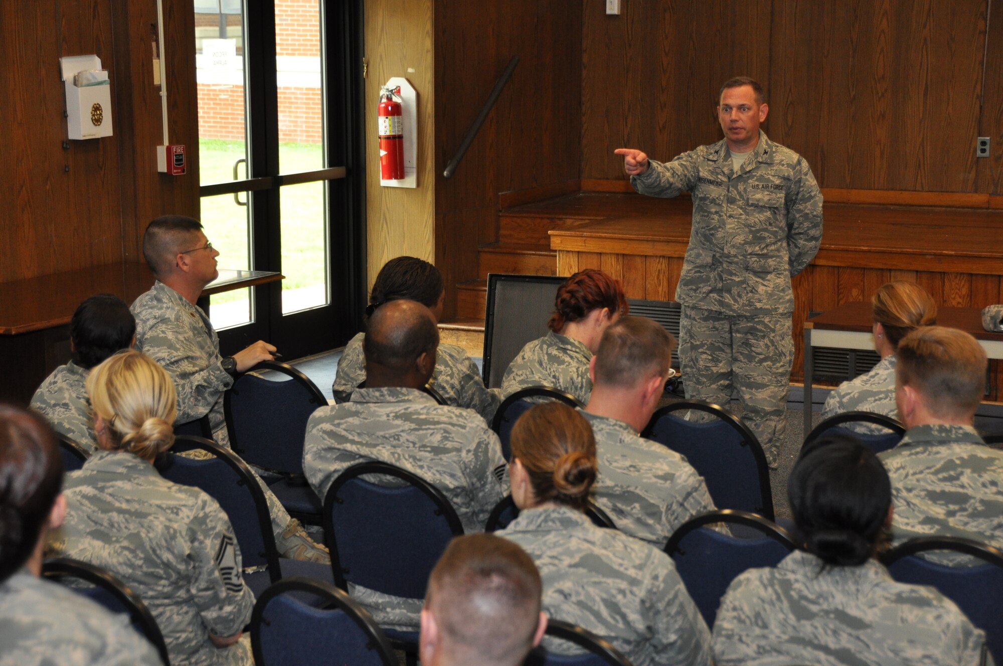 U.S. Air Force Col. Steven Rosenmeier, a Reserve Officers Association representative, answers questions in a town hall meeting Saturday, May 3, 2014. The ROA visited the 459th Air Refueling Wing to see what reservists go through on a drill weekend and hear what the current issues are as to better advocate for what is needed. (U.S. Air Force photo/ Staff Sgt. Brent Skeen)