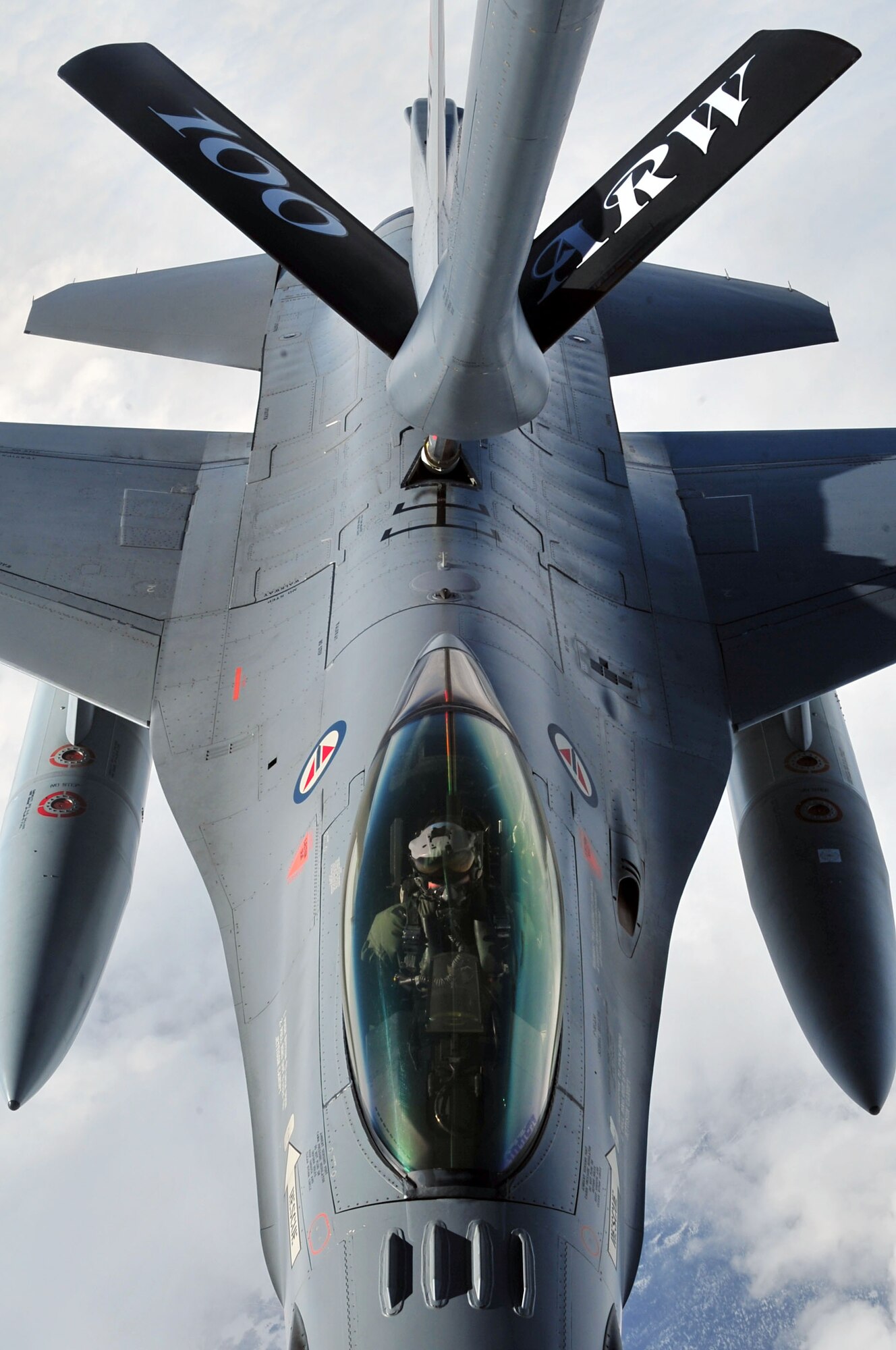 A Royal Norwegian Air Force F-16 Fighting Falcon takes fuel from a 100th Air Refueling Wing KC-135 Stratotanker during routine training over Sweden May 7, 2014. The KC-135 can transfer up to 200,000 pounds of fuel during a mission. The 100th ARW provides refueling for aircraft throughout Europe, Africa and Southwest Asia.  (U.S. Air Force photo by Senior Airman Christine Griffiths/Released) 