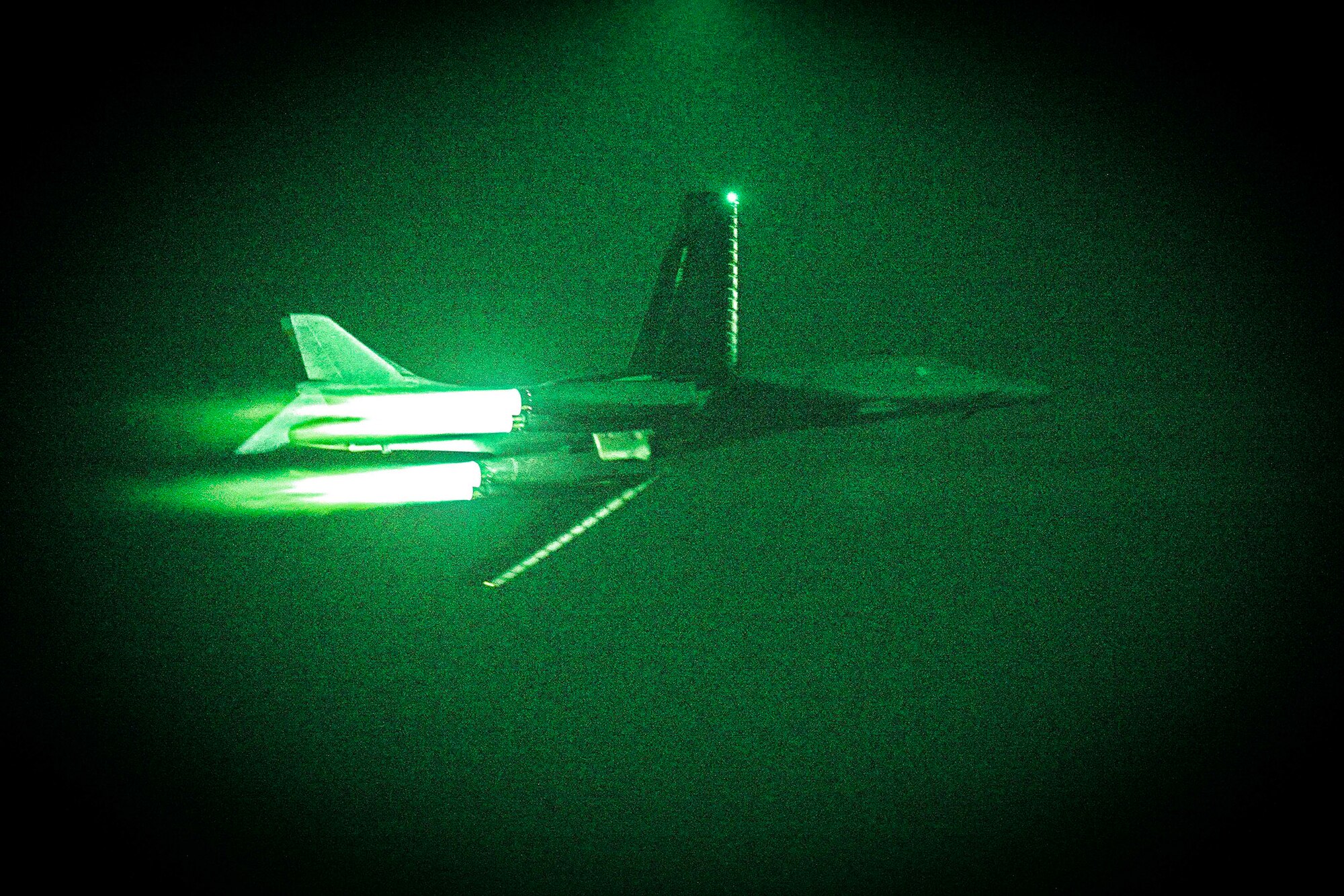 A B-1B Lancer deployed from Ellsworth Air Force Base, South Dakota,flies a night sortie May 4 at Al Udeid Air Base, Qatar. The multi-mission B-1 is the backbone of America's long-range bomber force.  The B-1 was initially developed in the 1970s as a strategic bomber and as a replacement to the B-52 Stratofortress. (U.S. Air Force photo illustration/Senior Airman Jared Trimarchi)
