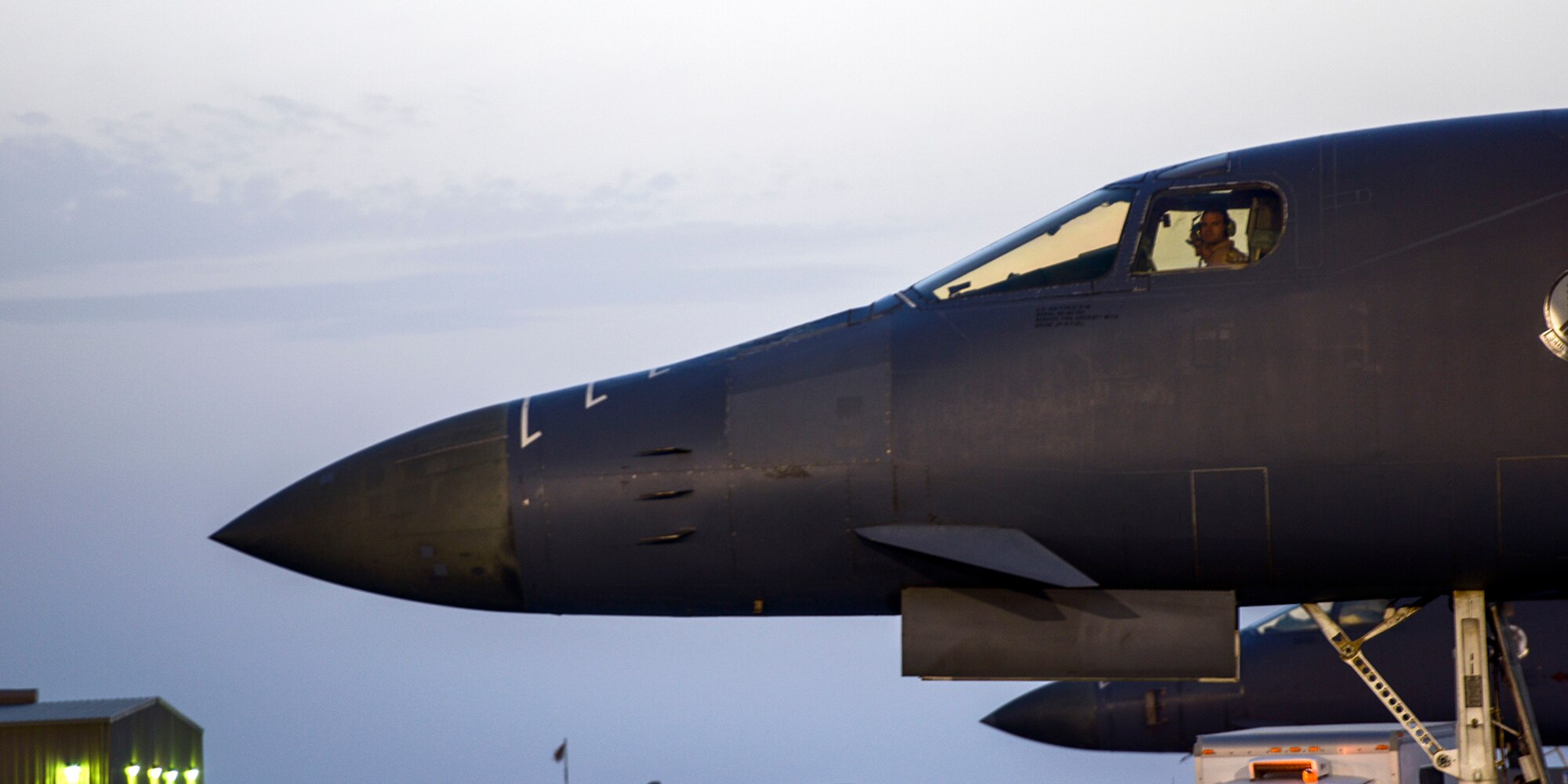 B-1B Lancer pilot deployed from Ellsworth Air Force Base, South Dakota, performs preflight checks, May 4 at Al Udeid Air Base, Qatar. The multi-mission B-1 is the backbone of America's long-range bomber force. The B-1 carries the largest payload of both guided and unguided weapons in the Air Force inventory. (U.S. Air Force photo/Senior Airman Jared Trimarchi)