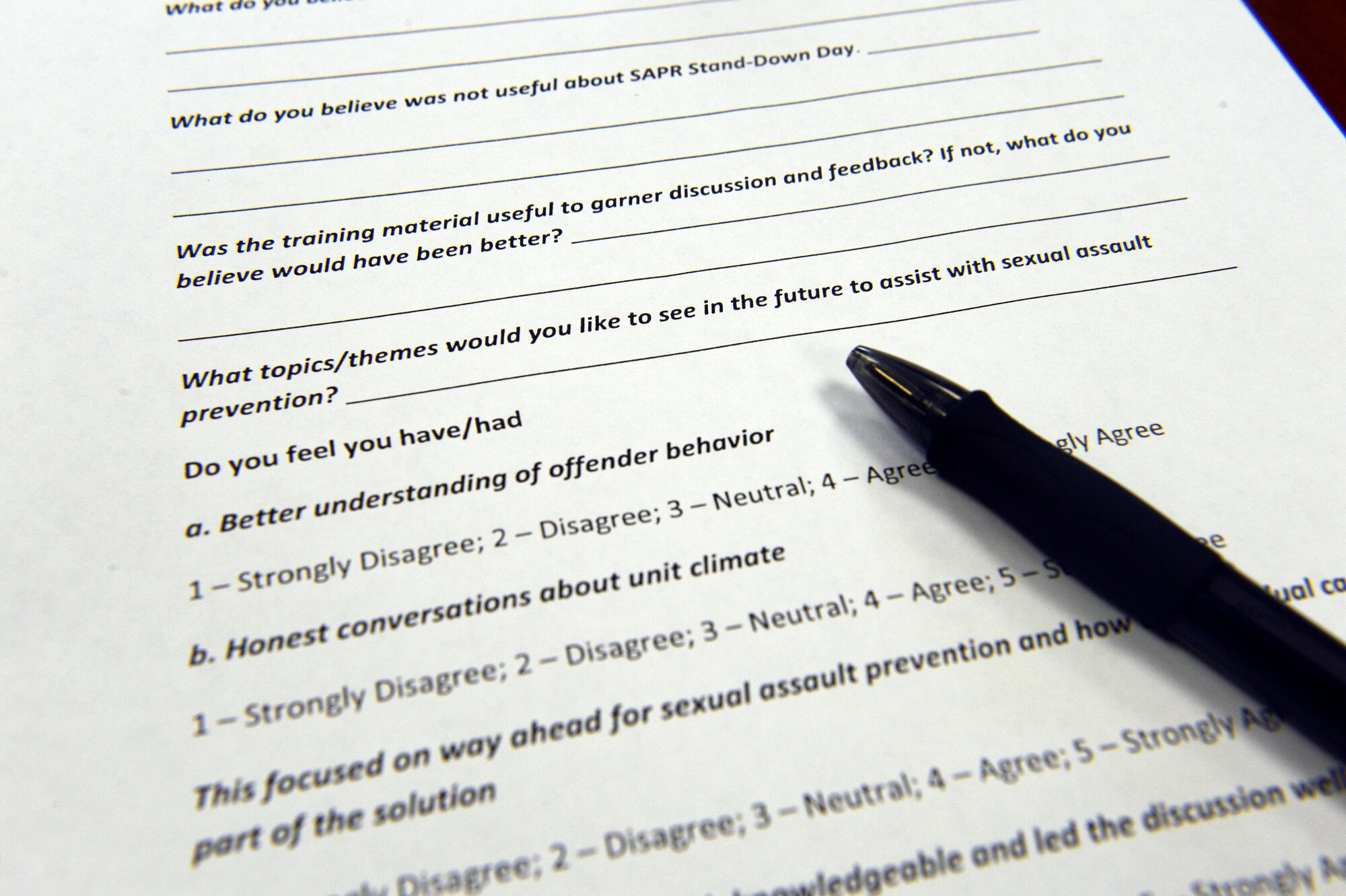 A pen rests on a survey May 7, 2014, at Spangdahlem Air Base, Germany. Service members provided feedback after attending this Sexual Assault Prevention and Response small-group discussion. The Air Force’s SAPR program, created in 2005, aims to prevent and respond to sexual assault through a balance of focused education, compassionate advocacy and accountability to promote respect and dignity throughout the Air Force. The feedback helps shape future discussions. (U.S. Air Force photo by Staff Sgt. Daryl Knee/Released)