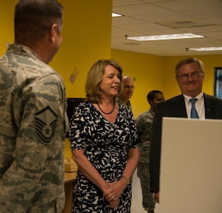 Secretary of the Air Force Deborah Lee James and her spouse, Frank Beatty, is briefed by Master Sgt. Stephen Boice, 628th Medical Operations Squadron superintendent May 6, 2014, at Joint Base Charleston, S.C. Boice was explaining the “Teddy Watch” program, a unique child care service provided for patients visiting the 628th Medical Group. James and Beatty toured several JB Charleston facilities including the Airman and Family Readiness Center, 628th MDG, Child Development Center, Sexual Assault and Prevention Center and concluded the visit with an All-call where she spoke to Airmen and Sailors of JB Charleston. (U.S. Air Force photo/ Airman 1st Class Clayton Cupit)