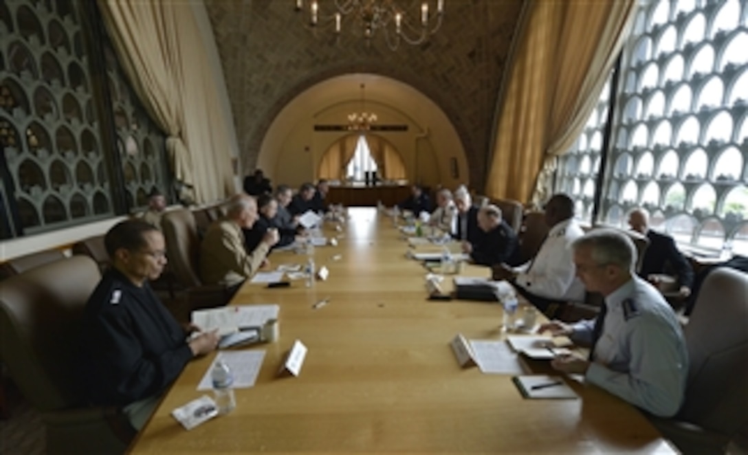 Defense Secretary Chuck Hagel, fourth on right, and Army Gen. Martin E. Dempsey, fifth on right, chairman of the Joint Chiefs of Staff, meet with global and regional combatant commanders at the National Defense University on Fort McNair in Washington, D.C., May 8, 2014. Hagel and Dempsey met with the commanders to discuss important regional and strategic developments going forward. 