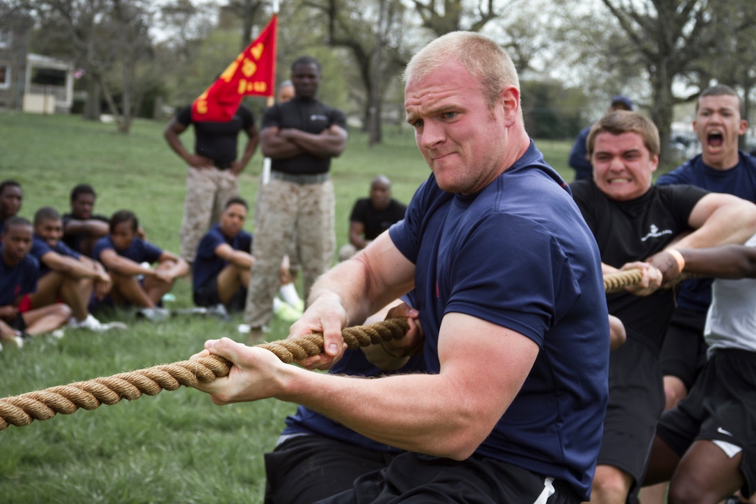 Cory Kirby, a member of Marine Corps Recruiting Station Baltimore’s delayed entry program, and a native of Odenton, Md., participates in a tug-of-war match during RS Baltimore’s annual statewide pool Function at Aberdeen Proving Grounds, Md., April 26, 2014. The purpose of the statewide pool function is to build camaraderie among the members of the delayed entry program while physically and mentally preparing them for recruit training. (U.S. Marine Corps photo by Sgt. Bryan Nygaard/Released)