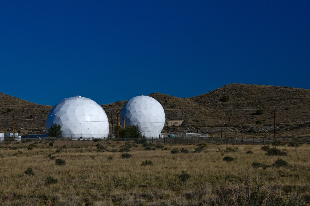 KIRTLAND AIR FORCE BASE, N.M. – Two RADOMEs are seen in this 2011 District photo drive submission.  The word “RADOME” originated during the 1940s and comes from blending the words “radar” and “dome.”  Photo by Richard Banker, Oct. 24, 2011. 