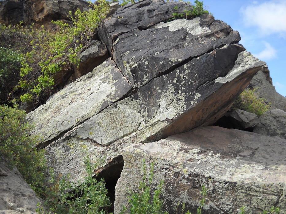 JOHN MARTIN RESERVOIR & DAM, Colo., -- Vandalism in the form of bullet holes shot into an Archaic Period [6,000 B.C. – A.D. 100] petroglyph panel.  The photo was taken during an archaeological-guided tour given by the photographer, Gregory Everhart, March 24, 2011.