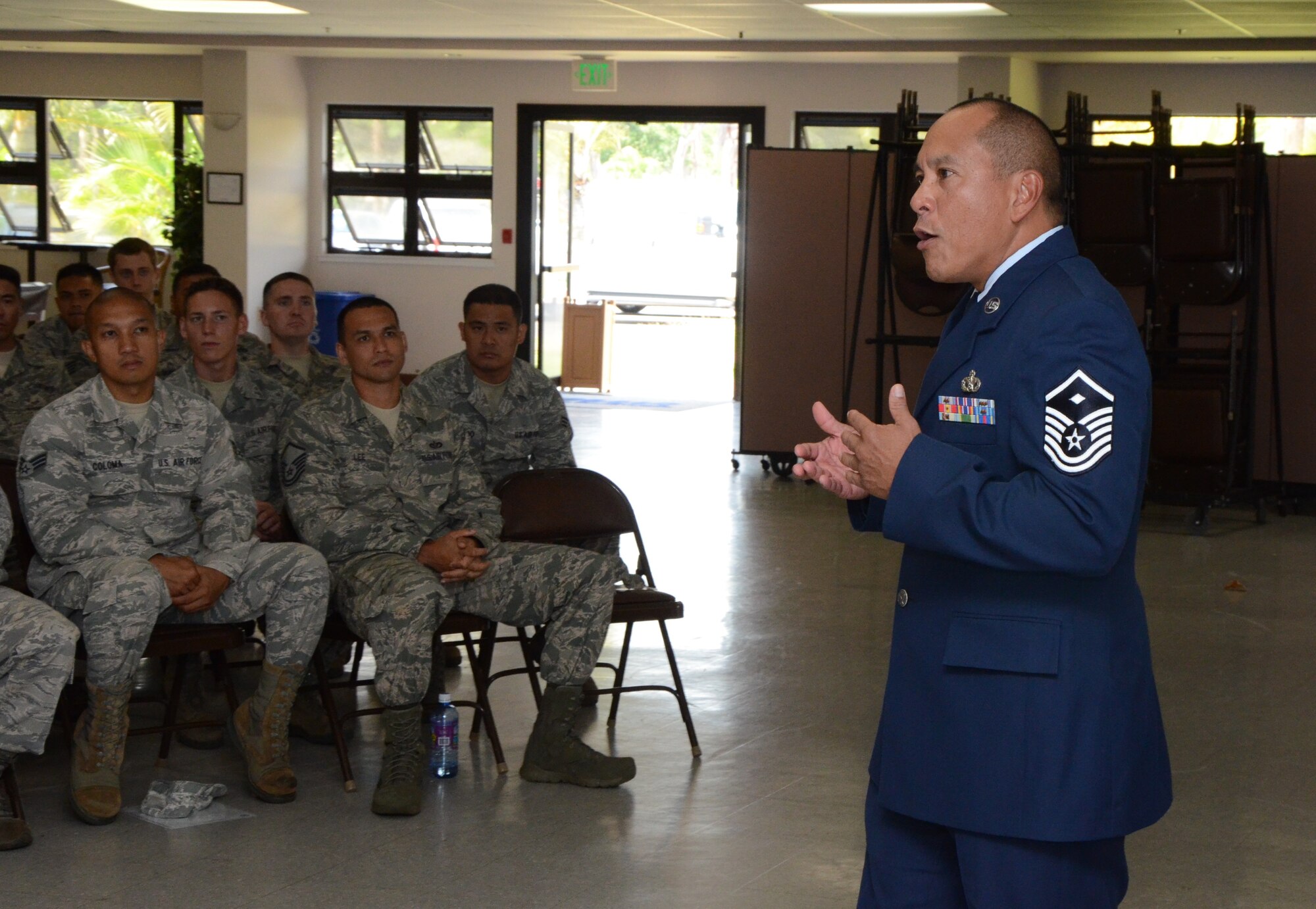 Master Sgt. Victor Palomares, right, first sergeant with the 624th Civil Engineering Squadron, gives refresher training on sexual assault and awareness to unit members at the Makai Recreation Center, Joint Base Pearl Harbor-Hickam, Hawaii, April 13, 2014. The training was part of the 624th CES’ commanders call held during the reservists’ unit training assembly. (U.S. Air Force photo by Tech. Sgt. Phyllis Keith)