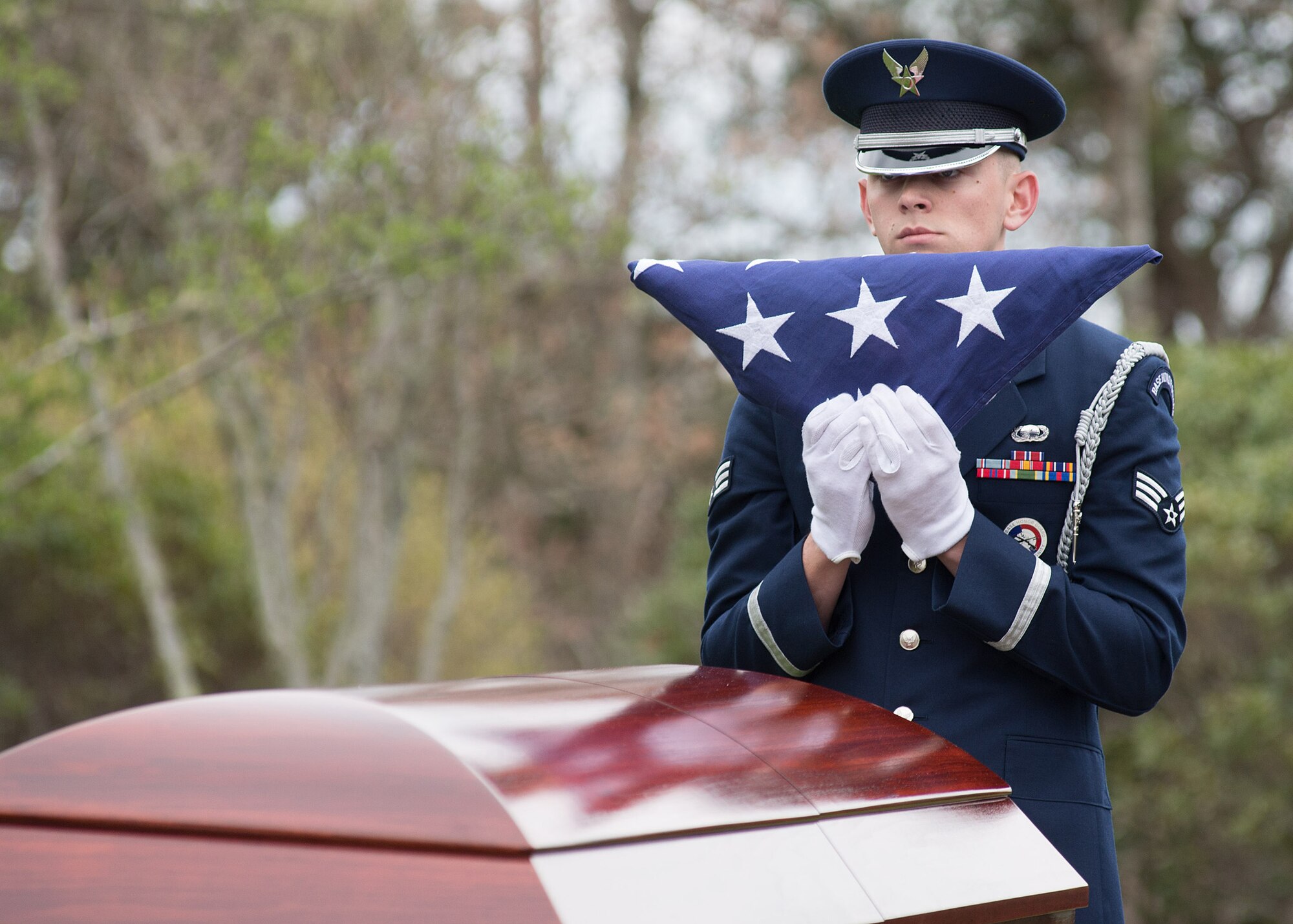 BOURNE, Mass. – Senior Airman Garrison Cullers, Patriot Honor Guard member from Hanscom Air Force Base, Mass. serves as the NCO Pallbearer at the funeral for retired Lt. Col. James "Goody" Goodson, a World War II U.S. Army Air Corps ace and former prisoner of war, at Bourne Massachusetts National Veterans' Cemetery, May 9. Goodson, who passed away May 1 at age 93, was credited with 15 aerial kills and 15 ground kills during World War II. His honors include the Silver Star, nine awards of the Distinguished Flying Cross, the Purple Heart and 21 awards of the Air Medal. (U.S. Air Force photo by Mark Herlihy)