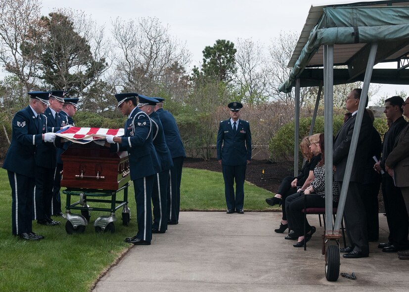 BOURNE, Mass. – Members of the Patriot Honor Guard from Hanscom Air Force Base, Mass. perform a six-mail flag folding detail at the funeral for retired Lt. Col. James "Goody" Goodson, a World War II U.S. Army Air Corps ace and former prisoner of war, at Bourne Massachusetts National Veterans' Cemetery, May 9. Goodson, who passed away May 1 at age 93, was credited with 15 aerial kills and 15 ground kills during World War II. His honors include the Silver Star, nine awards of the Distinguished Flying Cross, the Purple Heart and 21 awards of the Air Medal. (U.S. Air Force photo by Mark Herlihy)