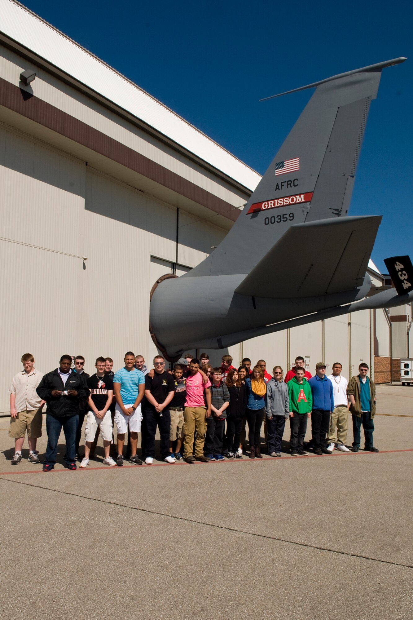 Navy Junior ROTC students from Anderson High School, Anderson, Ind., pose for a photo in front of a KC-135R Stratotanker aircraft at Grissom Air Reserve Base, Ind., April 23, 2014. Nearly 30 students from the ROTC detachment visited Grissom to learn more about the base, the Air Force and Marine Corps. (U.S. Air Force photo/Tech. Sgt. Douglas Hays)
