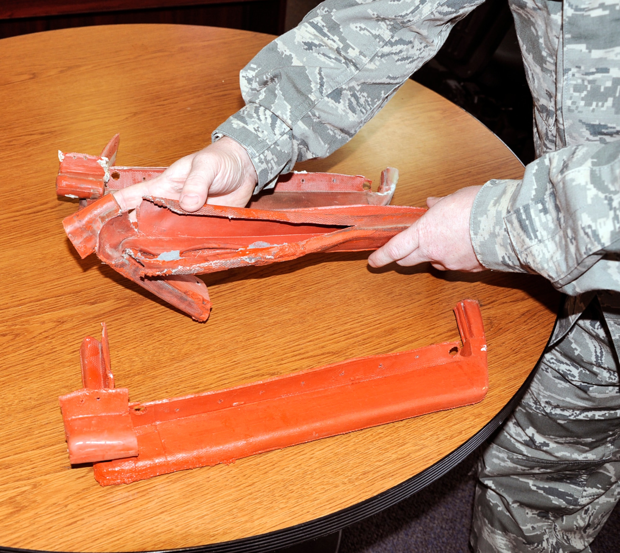 A damaged fixed fan duct seal is displayed after being removed from one of McChord’s C-17 Globemaster III aircraft May 5, 2014 at Joint Base Lewis-McChord. The Air Force is now waiting for The Boeing Company’s technical writers to provide repair procedures and fly-back limitations to be added to the technical orders. (U.S. Air Force photo/ Staff Sgt. Russ Jackson) 