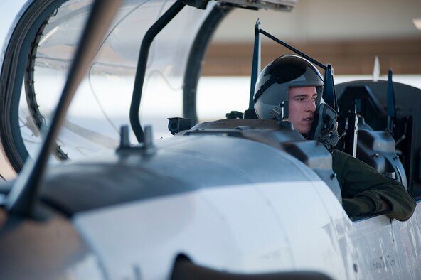 2nd Lt. Abraham Morland, an 80th Flying Training Wing student, held dual citizenship in both the United States and the United Kingdom. Having opportunities to fly for both countries, he eventually chose to renounce his British citizenship and fly for the United States Air Force.  Morland embarked on his first solo flight April 23, 2014. (U.S. Air Force photo by Airman 1st Class Jelani Gibson) 