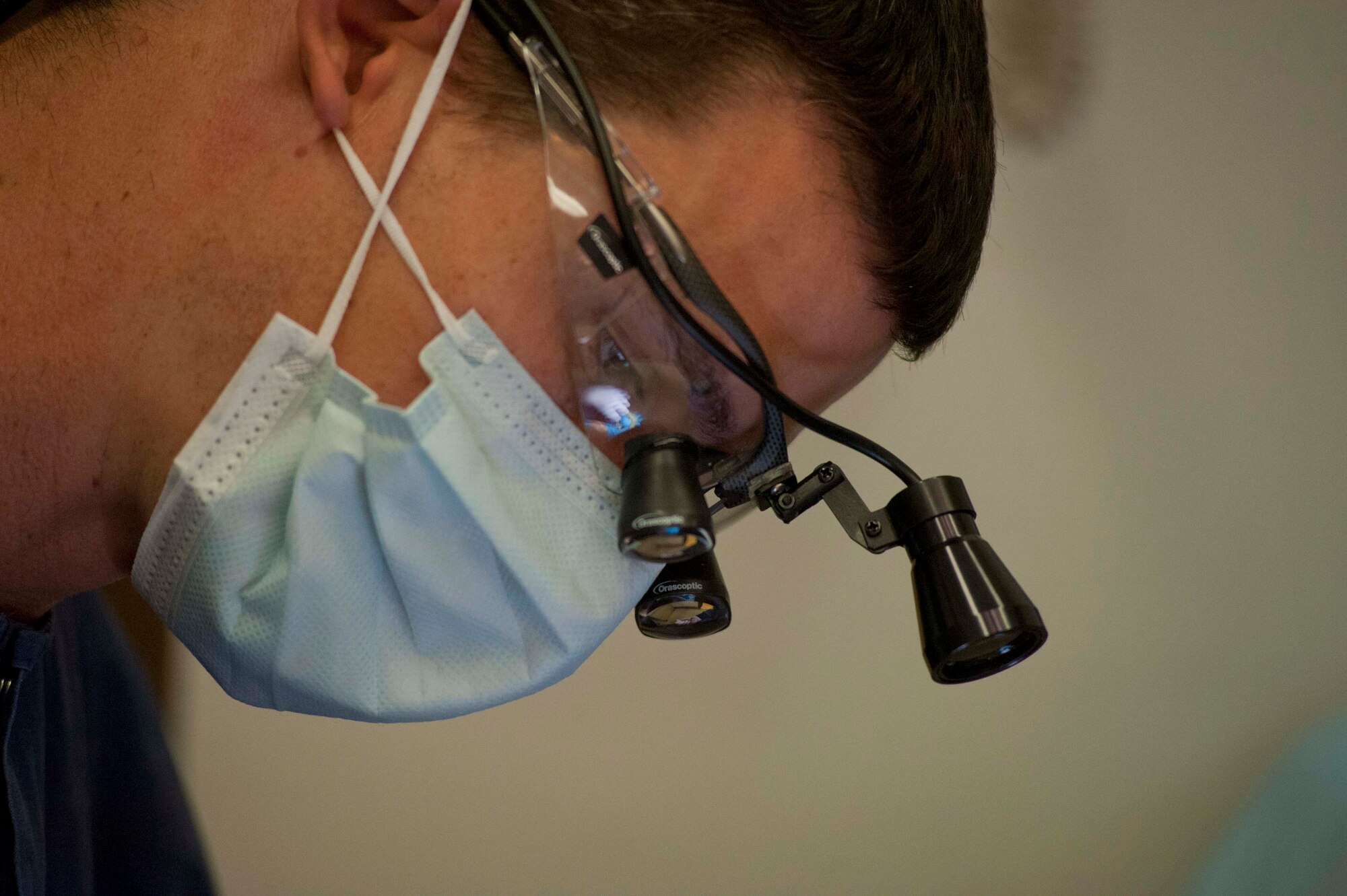 Capt. Brandon Keyser, 82nd Dental Squadron general dentist, performs a root canal May 5, 2014. The 82nd DS mission is to ensure adequate dental care is given across the entire base. (U.S. Air Force photo by Airman 1st Class Jelani Gibson) 