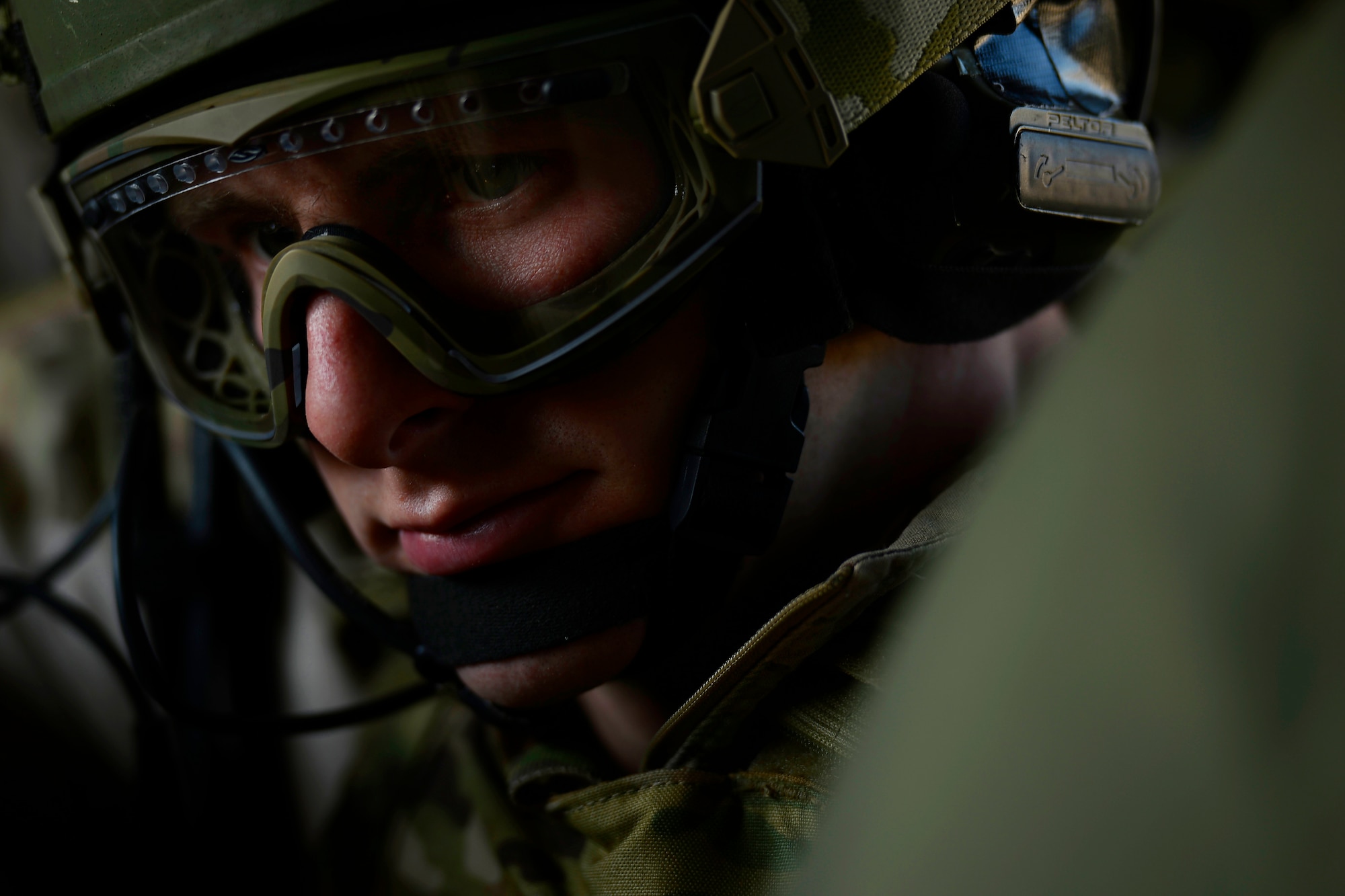 A U.S. Air Force combat controller with the Special Tactics Training Squadron prepares to fast-rope out of a Navy HH-60H Seahawk helicopter during Emerald Warrior 14 at Hurlburt Field, Fla., May 2, 2014. Emerald Warrior is a U.S. Special Operations Command-sponsored two-week joint/combined tactical exercise designed to provide realistic military training in an urban setting. (U.S. Air Force photo by Staff Sgt. Tim Chacon)