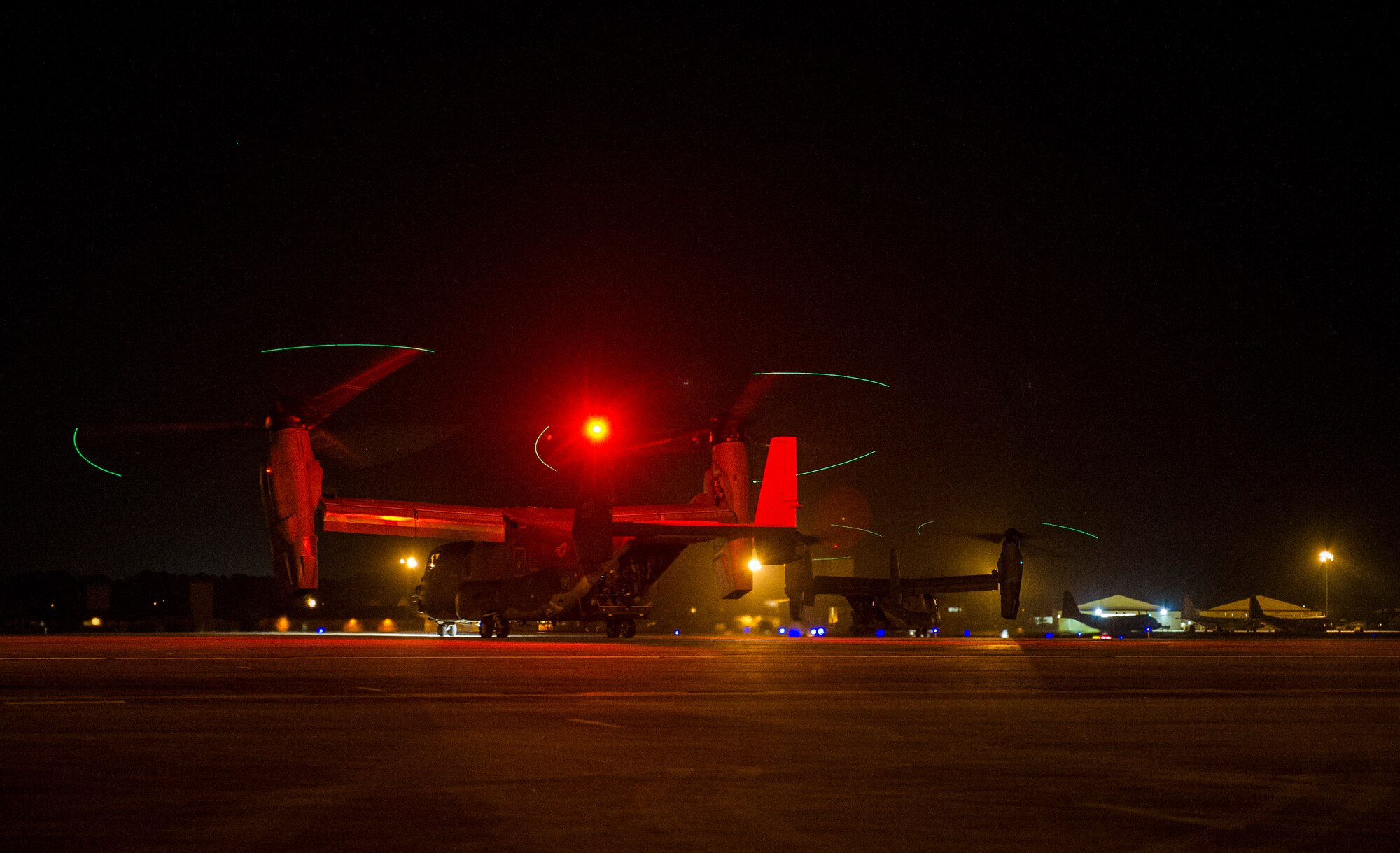 U.S. Air Force CV-22 Osprey tiltrotor aircraft prepare to take off on a mission at Hurlburt Field, Fla., May 5, 2014, during Emerald Warrior 14. Emerald Warrior is a U.S. Special Operations Command-sponsored two-week joint/combined tactical exercise designed to provide realistic military training in an urban setting. (U.S. Air Force photo by Staff Sgt. Marleah Miller)